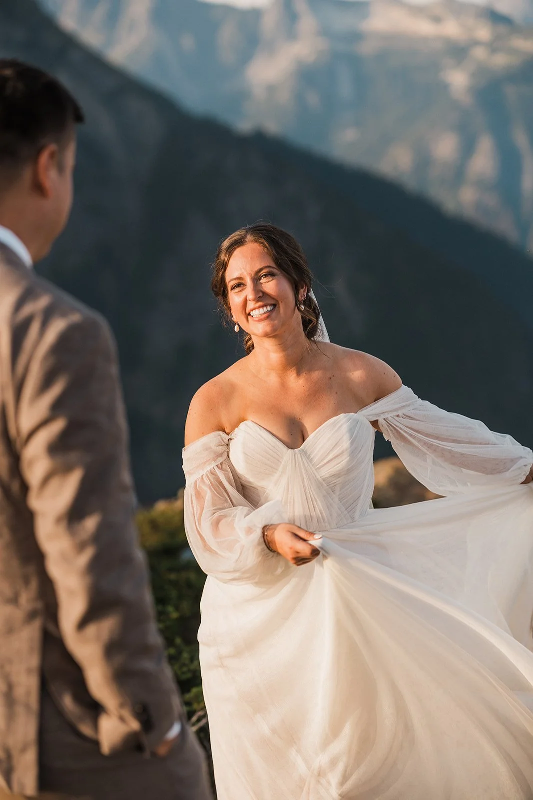 by Between the Pines - Bride wearing soft wedding hair and airbrush makeup during a Mt. Baker elopement