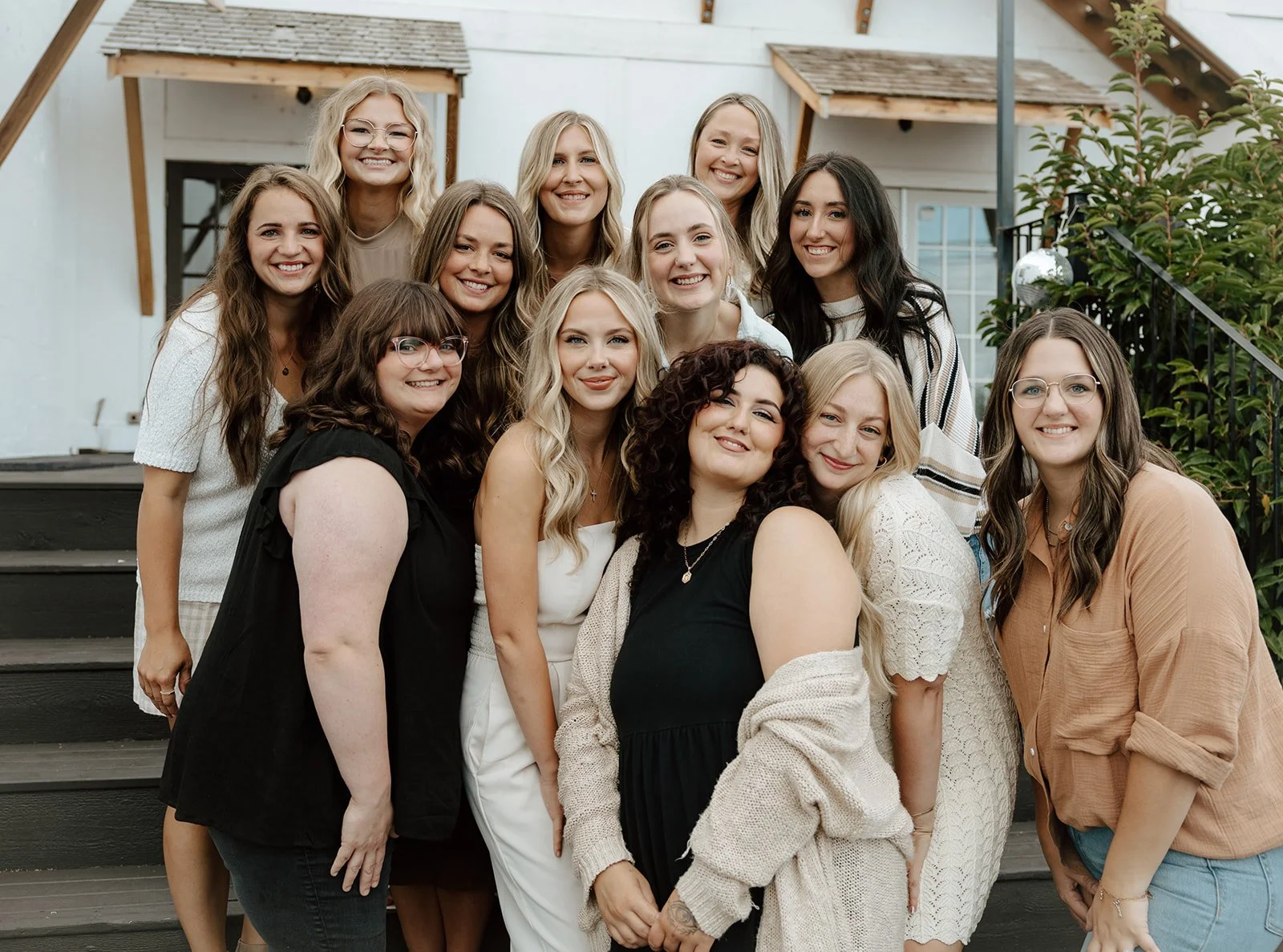 Symmetrie Bridal hair and makeup team preparing brides for their wedding day.