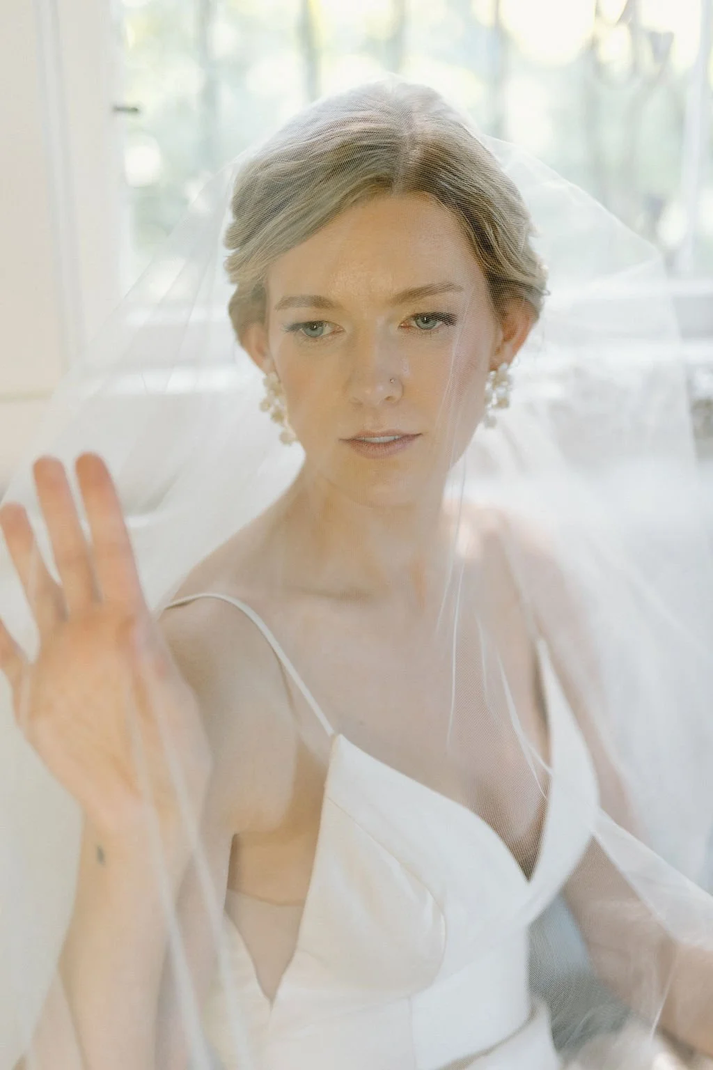 by Robin Co Studio, Bride wearing romantic bridal hair and natural makeup in Northwest Washington
