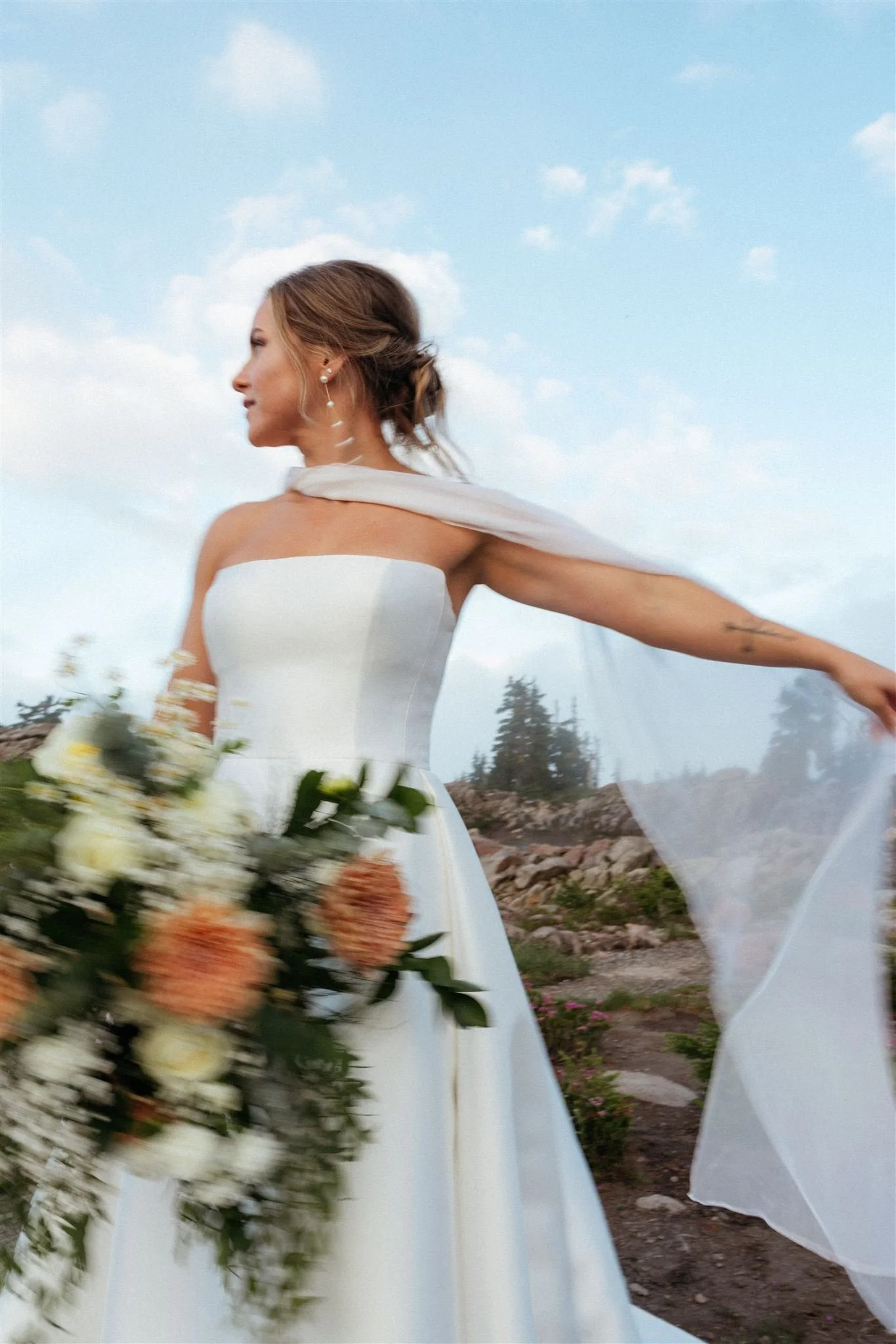 by Henry Tieu -Bride wearing soft wedding hair and airbrush makeup during a Mt. Baker elopement