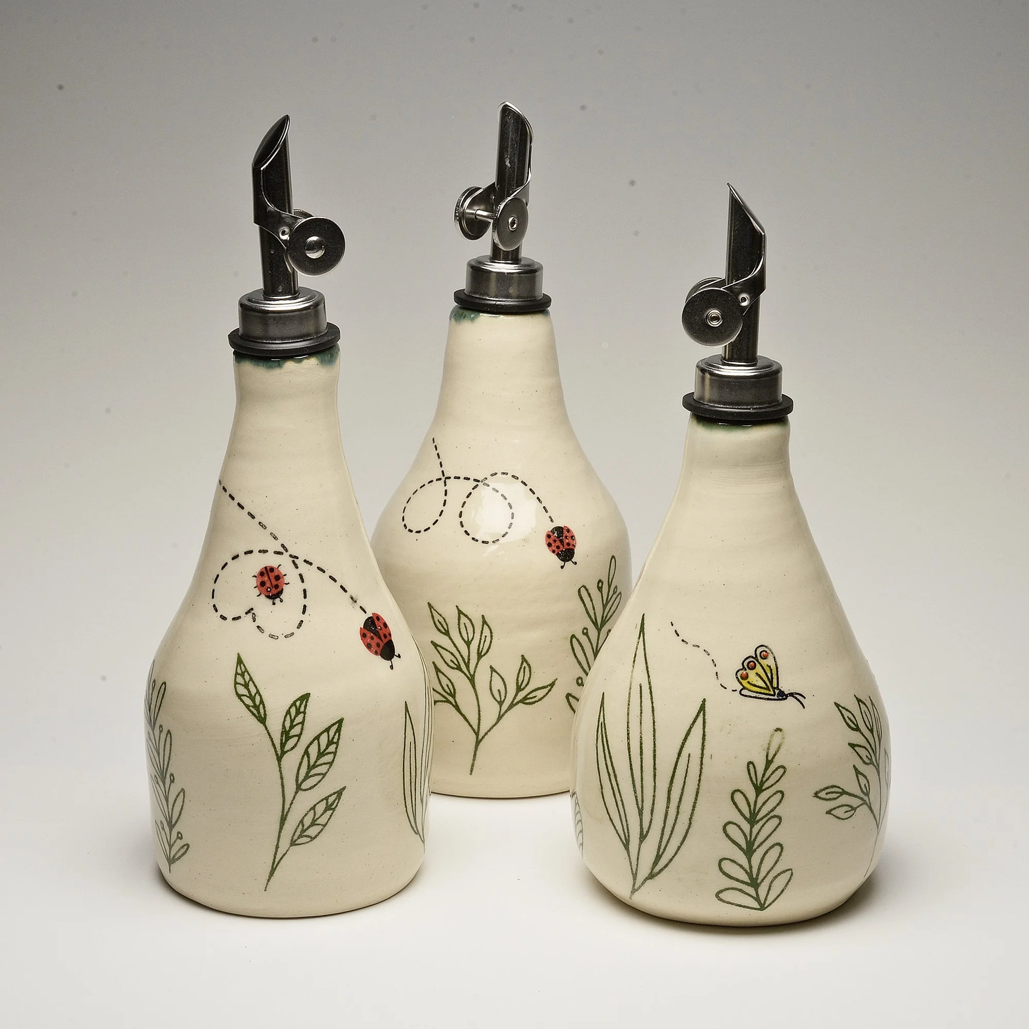 Nature's Grace Ceramic Serving Bottles