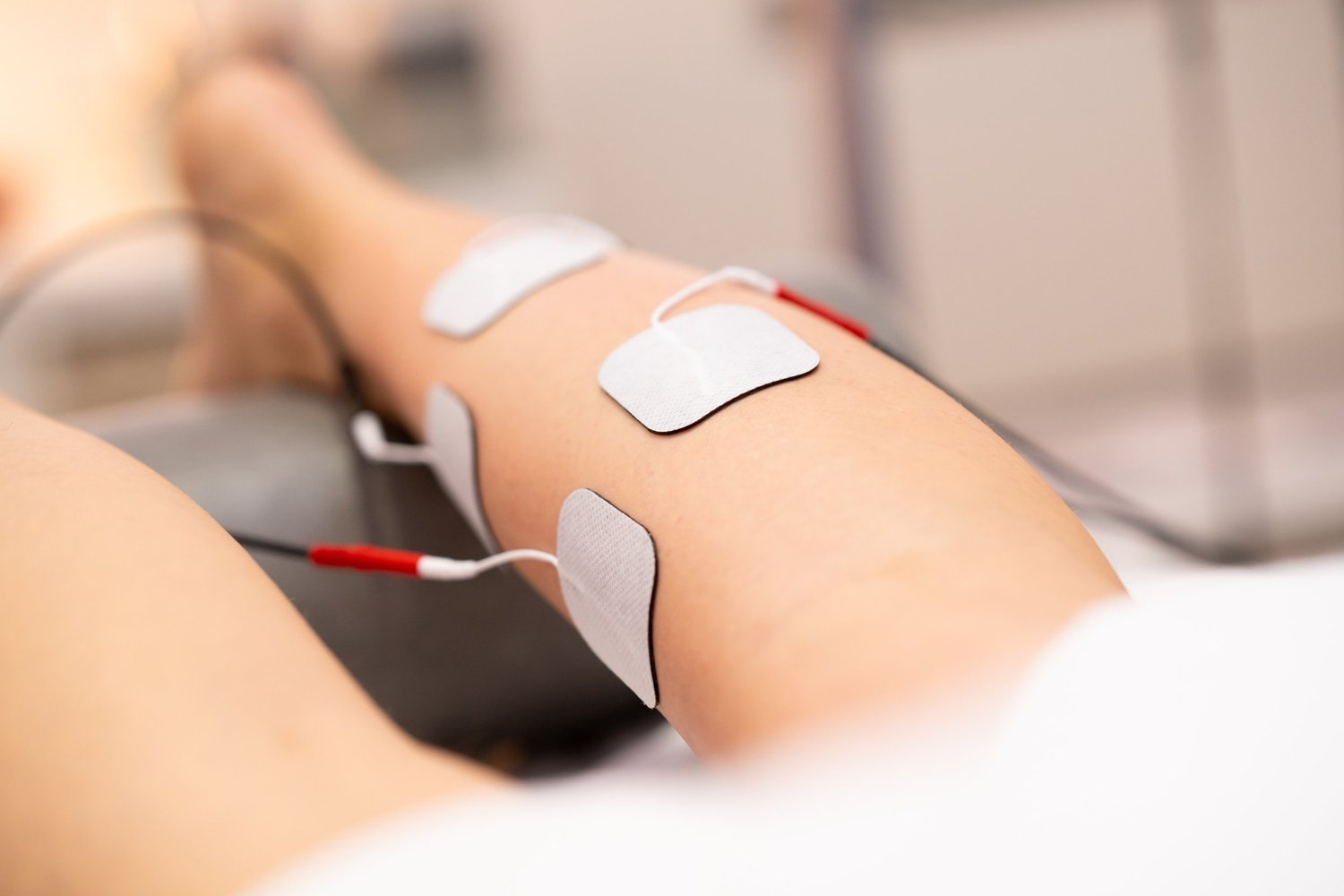 Electrical stimulation treatment at Oak City Physical Therapy