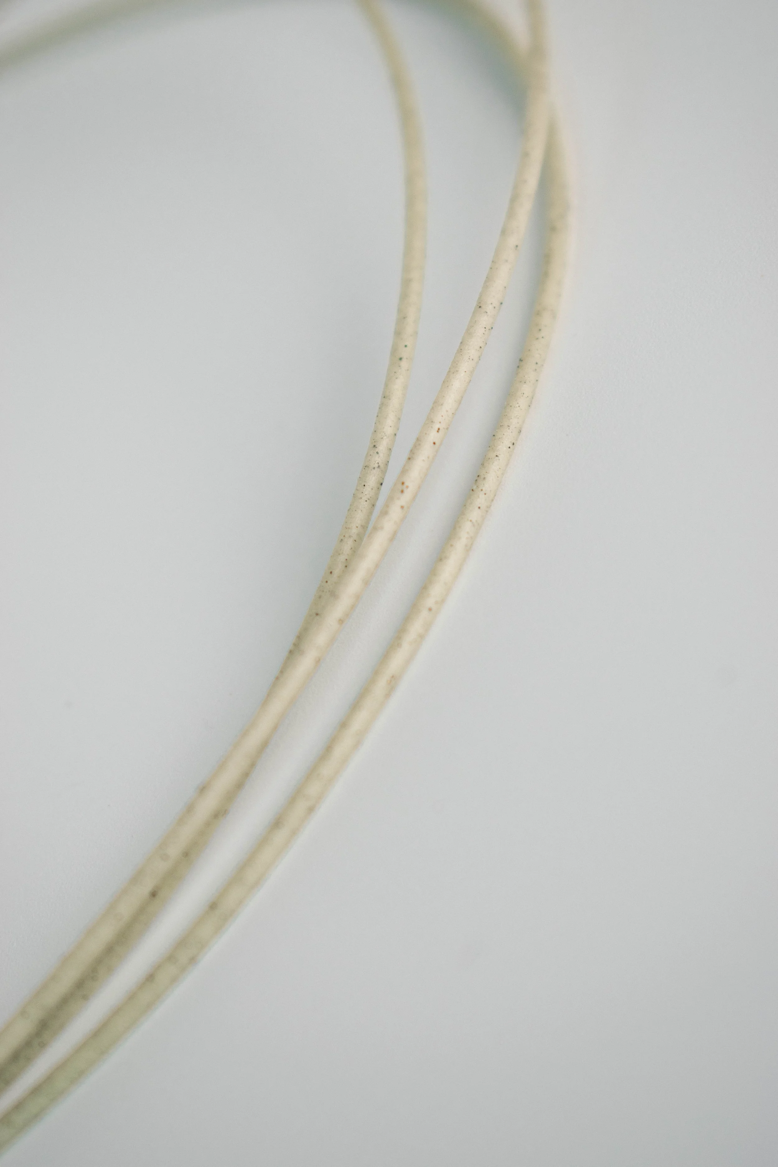 Macro view of Seaweed Green filament strands showing fine natural particles in the material