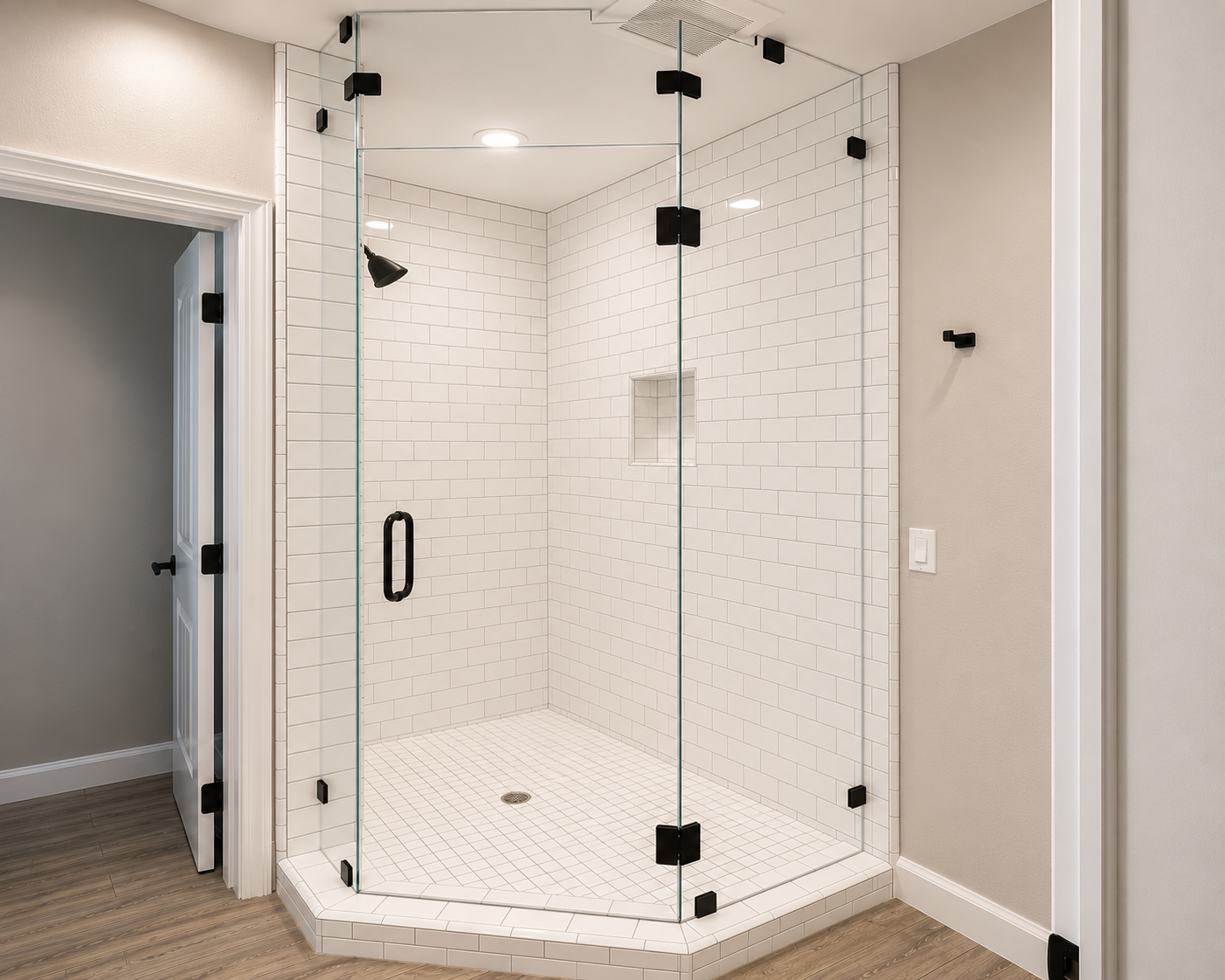 Celling height Neo-angled frameless shower door unit cleverly notched around celling vent allows homeowner to control the level of steam buildup with the flick of a switch. White subway tile with black hardware for a sleek modern touch.