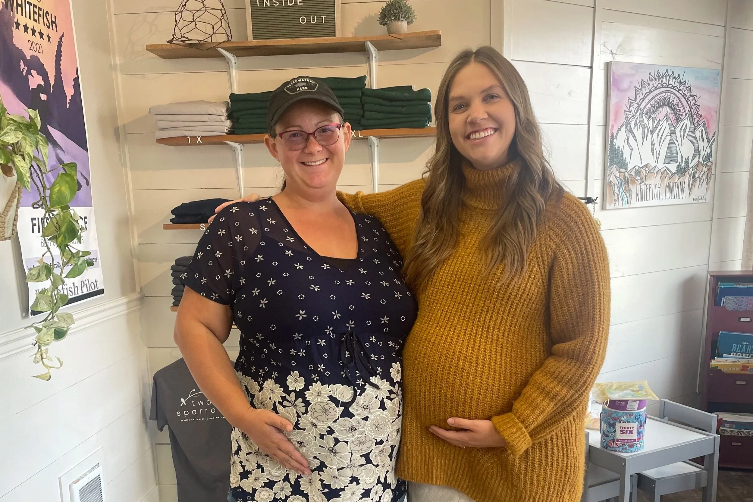 Dr. Jordan and her pregnant patient, taking a photo together after getting adjusted at her chiropractic clinic in whitefish, montana