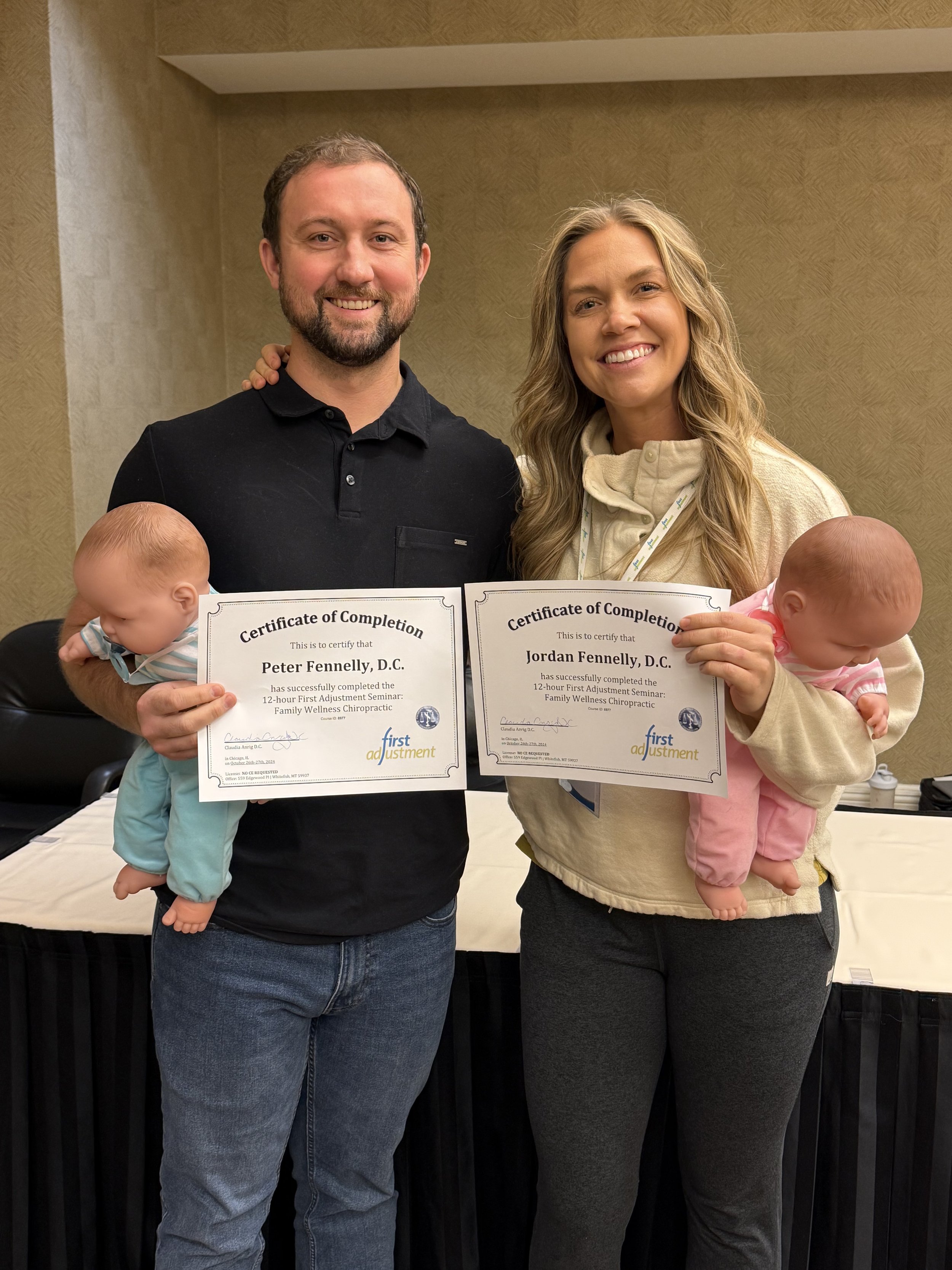 Dr. Peter and Dr. Jordan of Two sparrows in whitefish, montana, is pictured getting training and ceritifications in newborn chiropractic adjustments with Claudia Anrig