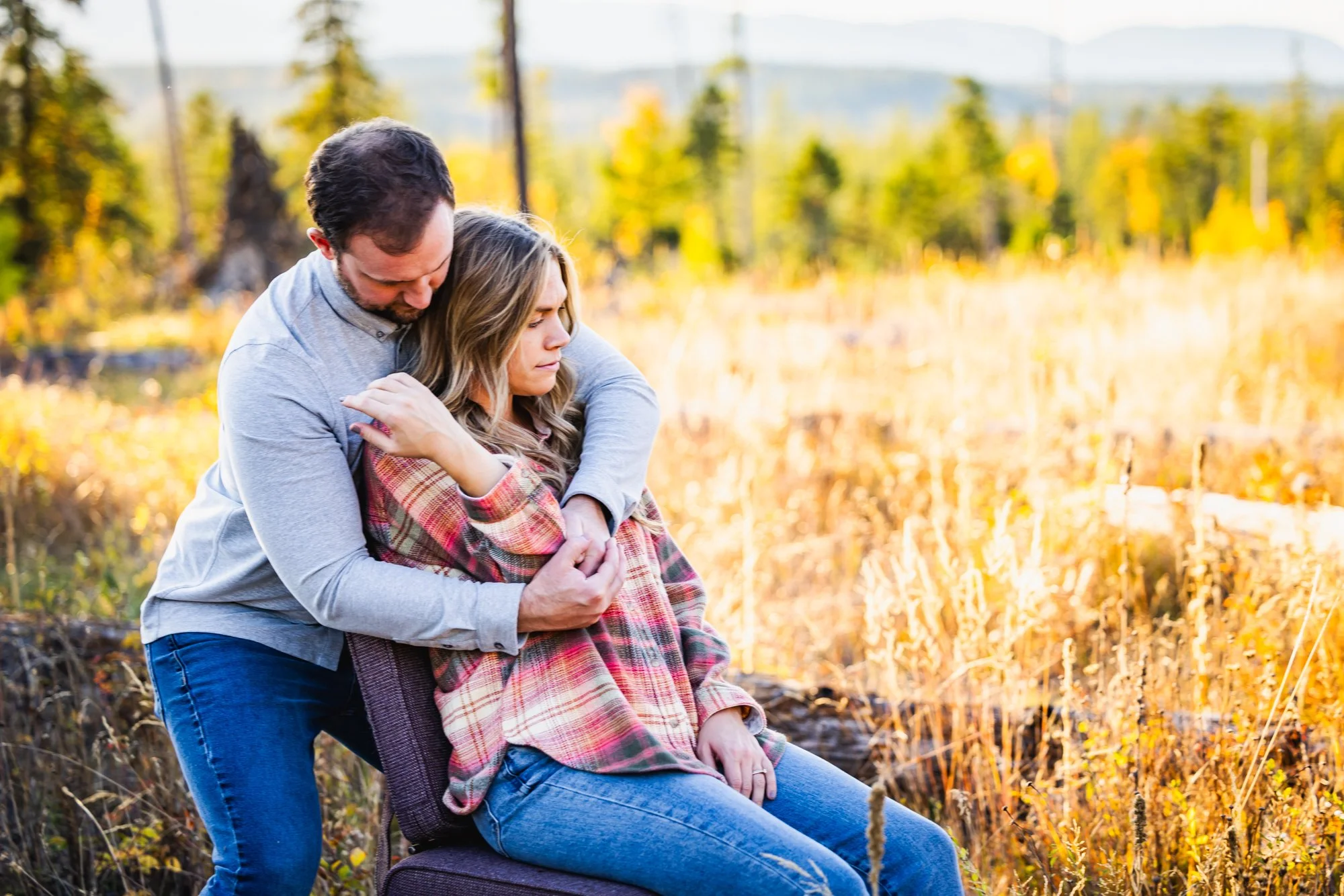 Dr. Peter Fennelly of Two Sparrows Family Chiropractic in whitefish, MT, adjusting a patient's shoulder.