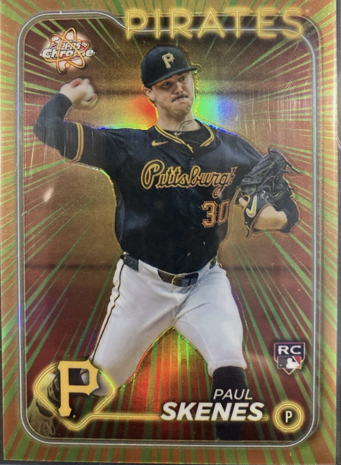 Baseball trading card featuring Paul Skenes in Pittsburgh Pirates uniform, in a pitching stance with glove on left hand, set against a holographic background with bright lines and the word "PIRATES" at top.