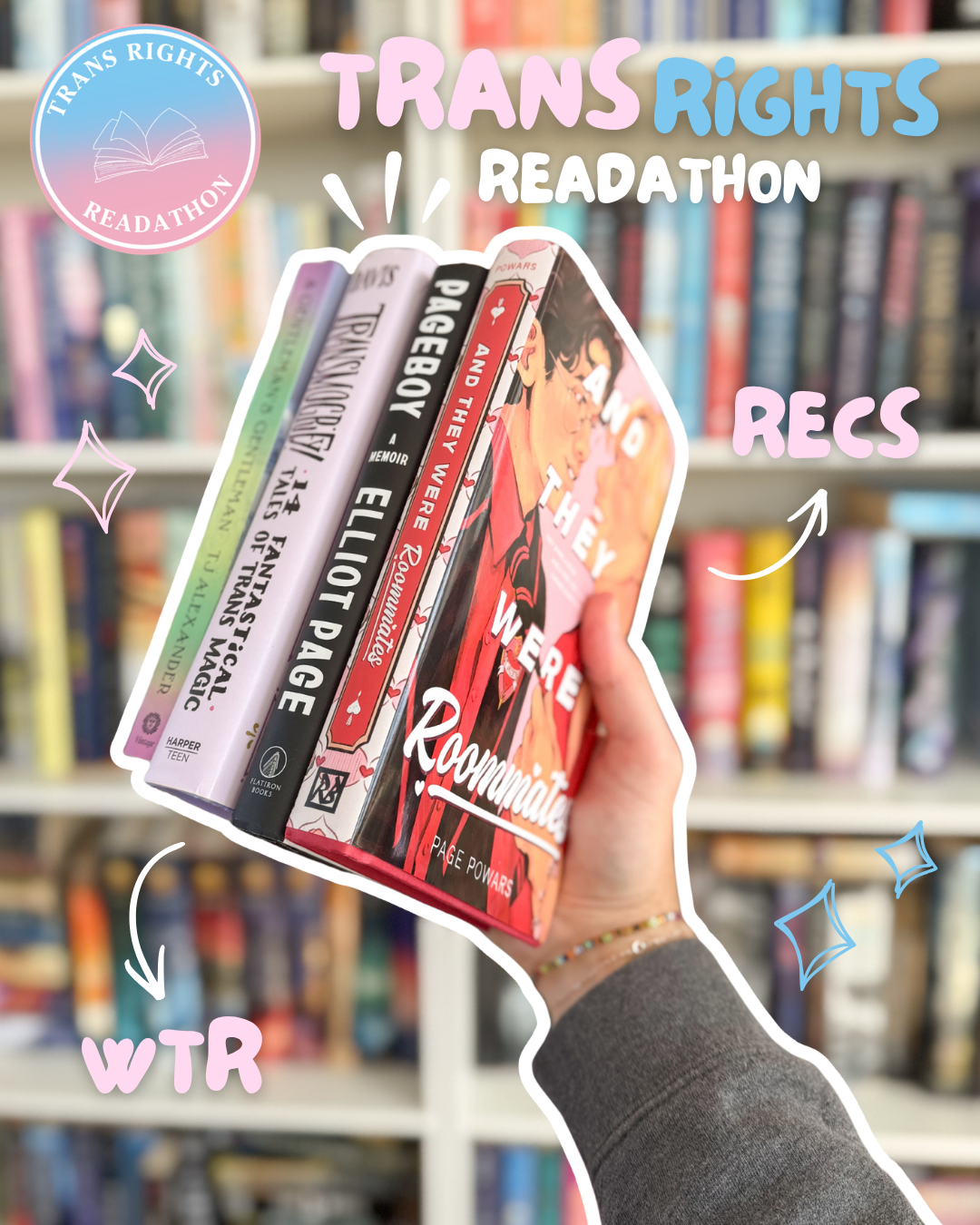 Hand holding a collection of books about trans rights in a library with shelves of books in the background.