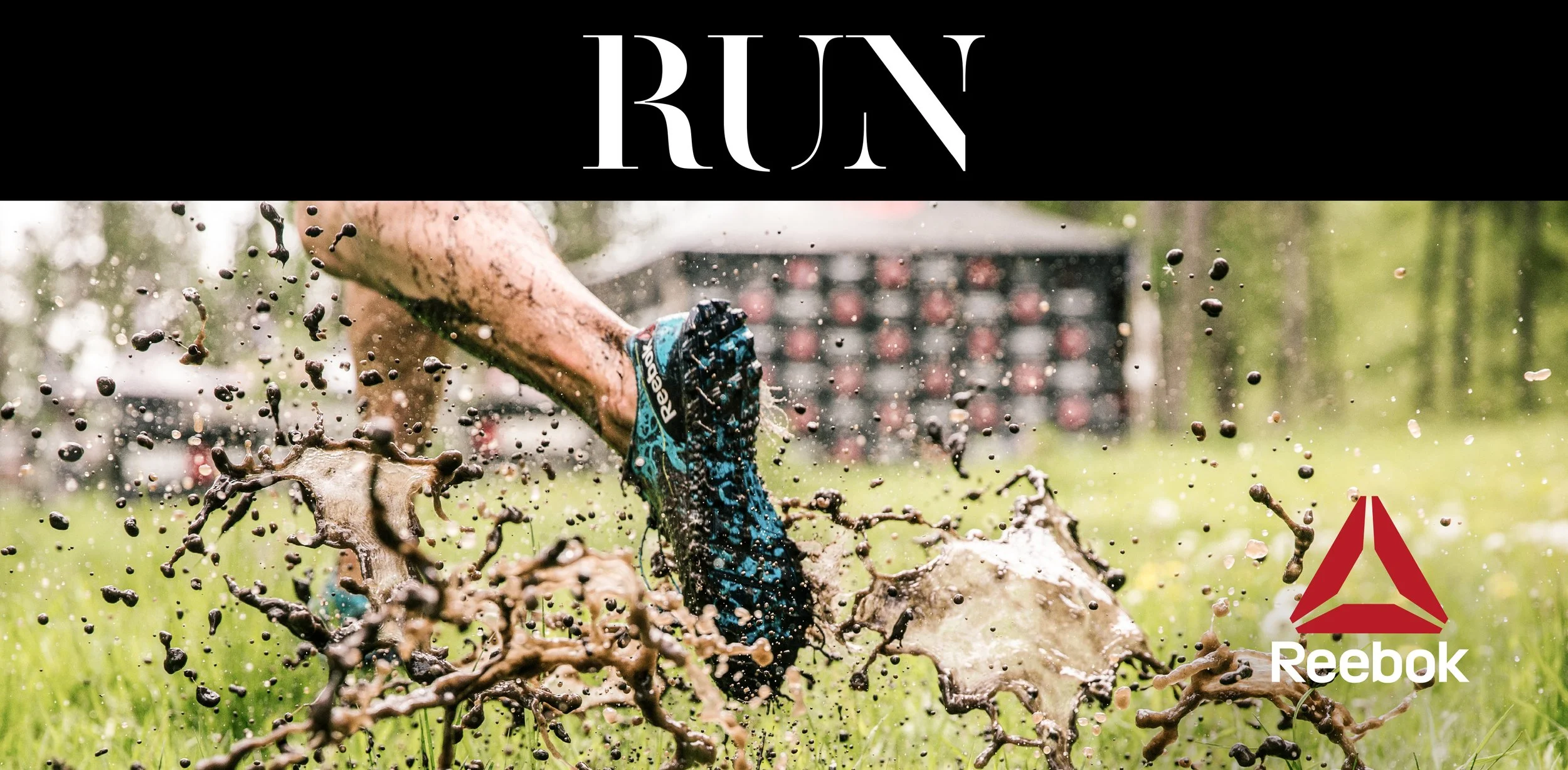 A person running and kicking up mud in a muddy obstacle course, with the Reebok logo in the bottom right corner and a black banner with the word 'RUN' at the top.