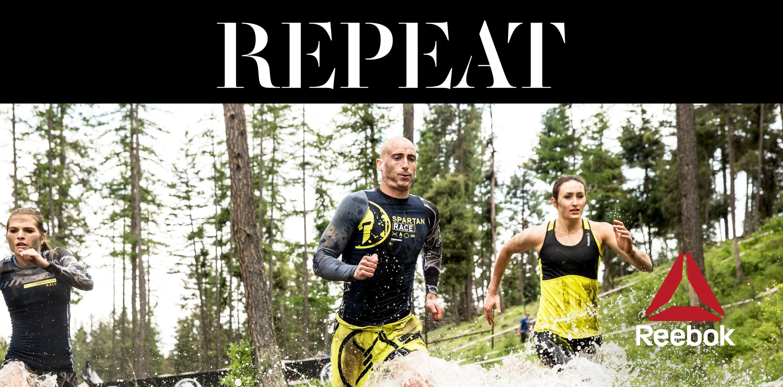 Three people running through a forest trail, muddy and wet, participating in an outdoor race, with the Reebok logo in the bottom right corner.
