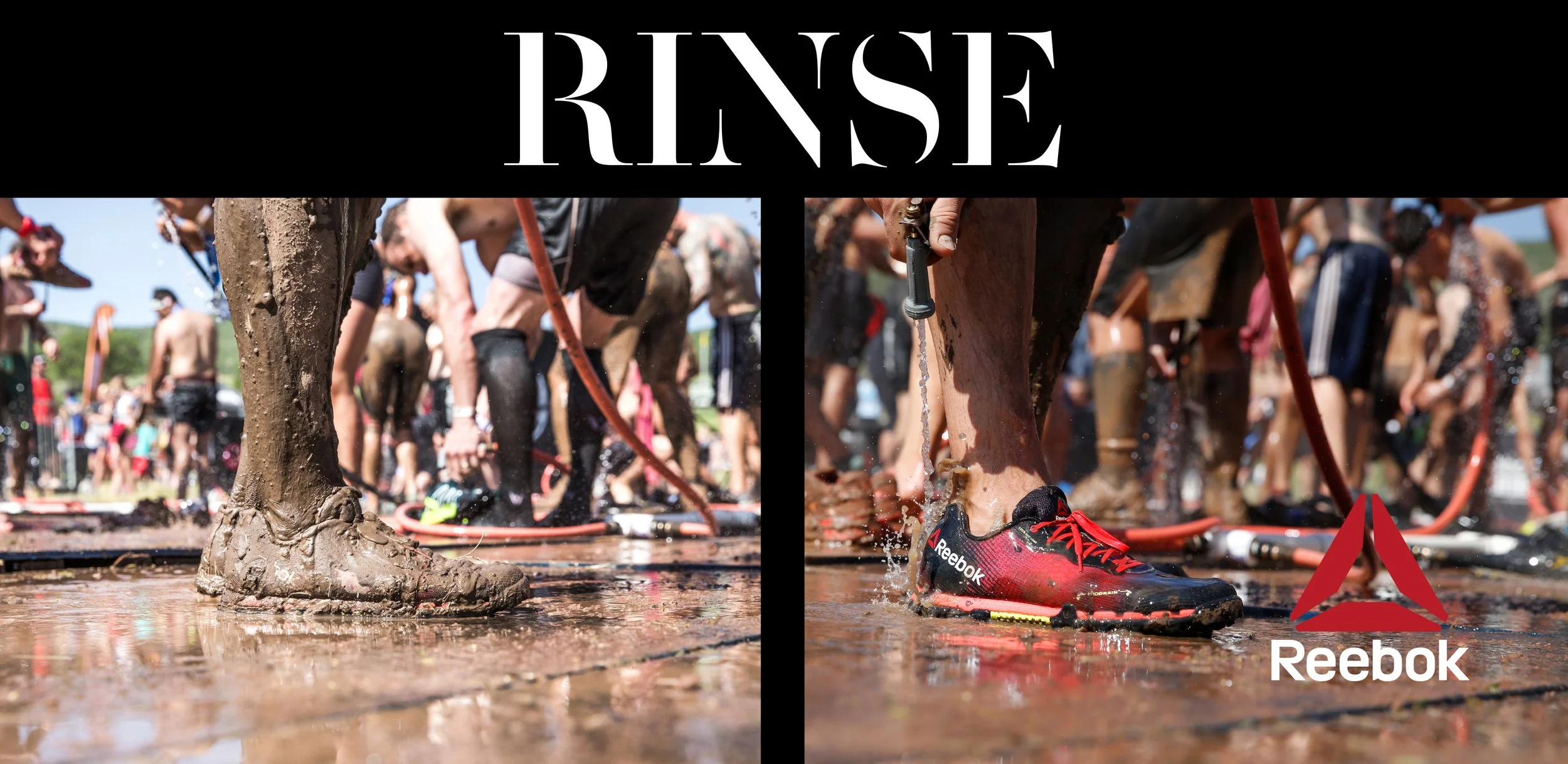 Participants in a Reebok challenge are crawling through mud outdoors, some wearing athletic shoes and outfits, with a crowd in the background, under a largely clear sky.