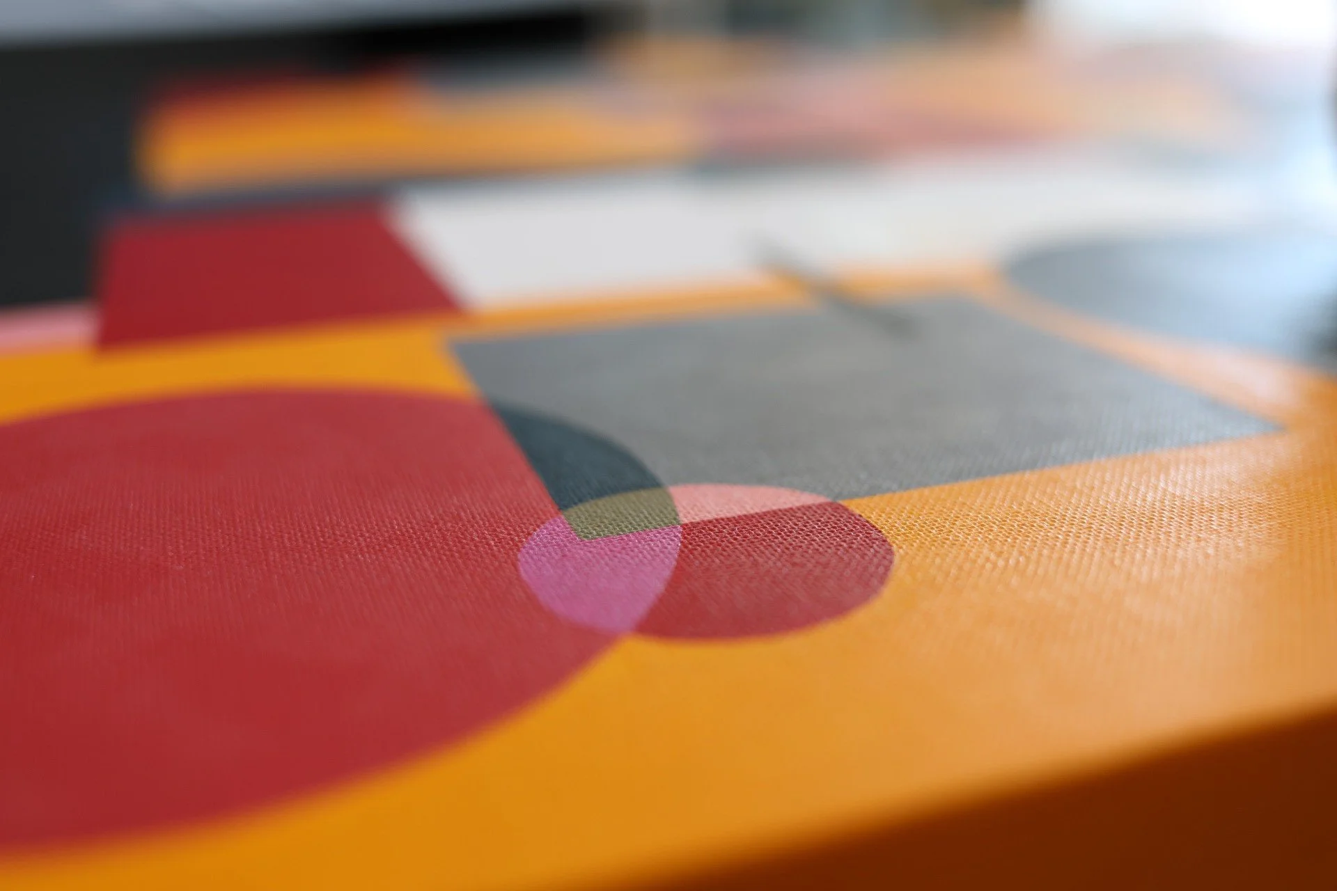 Close-up of a colorful Monopoly board game with visible game pieces and property cards.