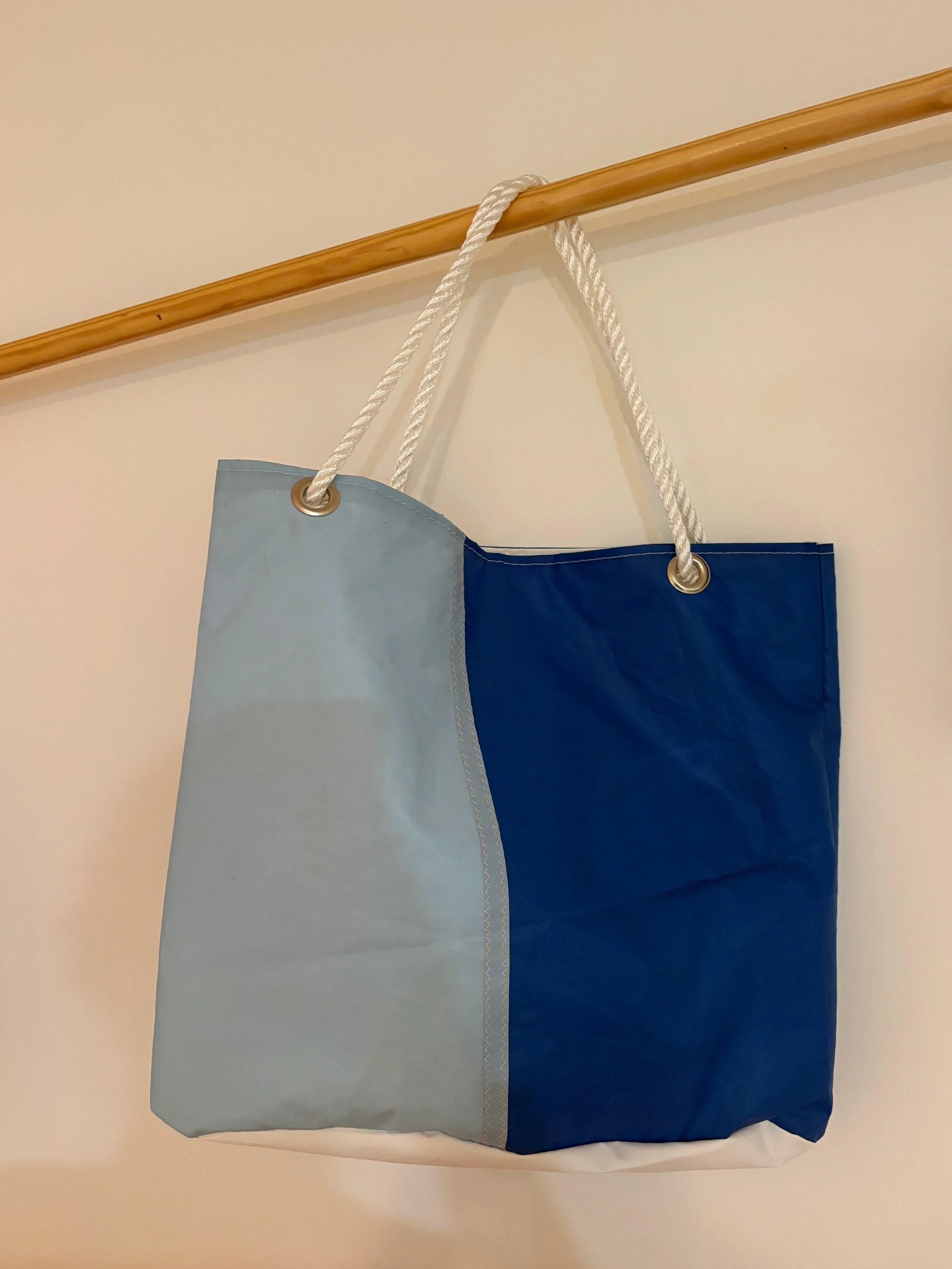 Sailbag totes are lined and come in a variety of sizes. They're all designed to bring some color and sustainability to your every day shopping.