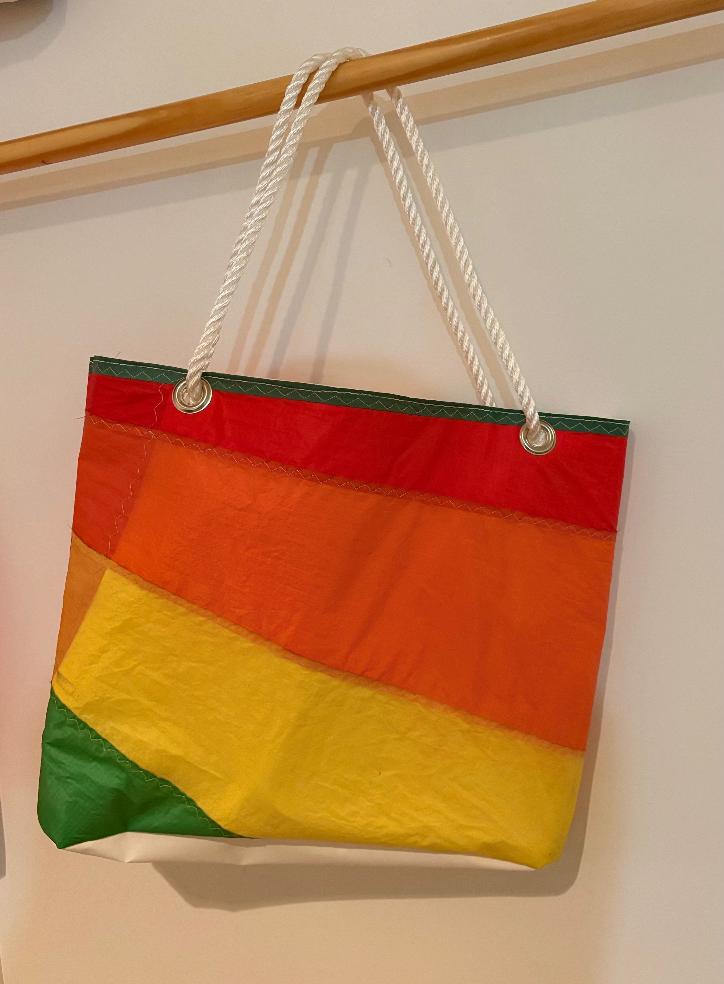 Whether you're looking for color or class, our one-of-a-kind refurbished sail bags bring personality to every outing. 