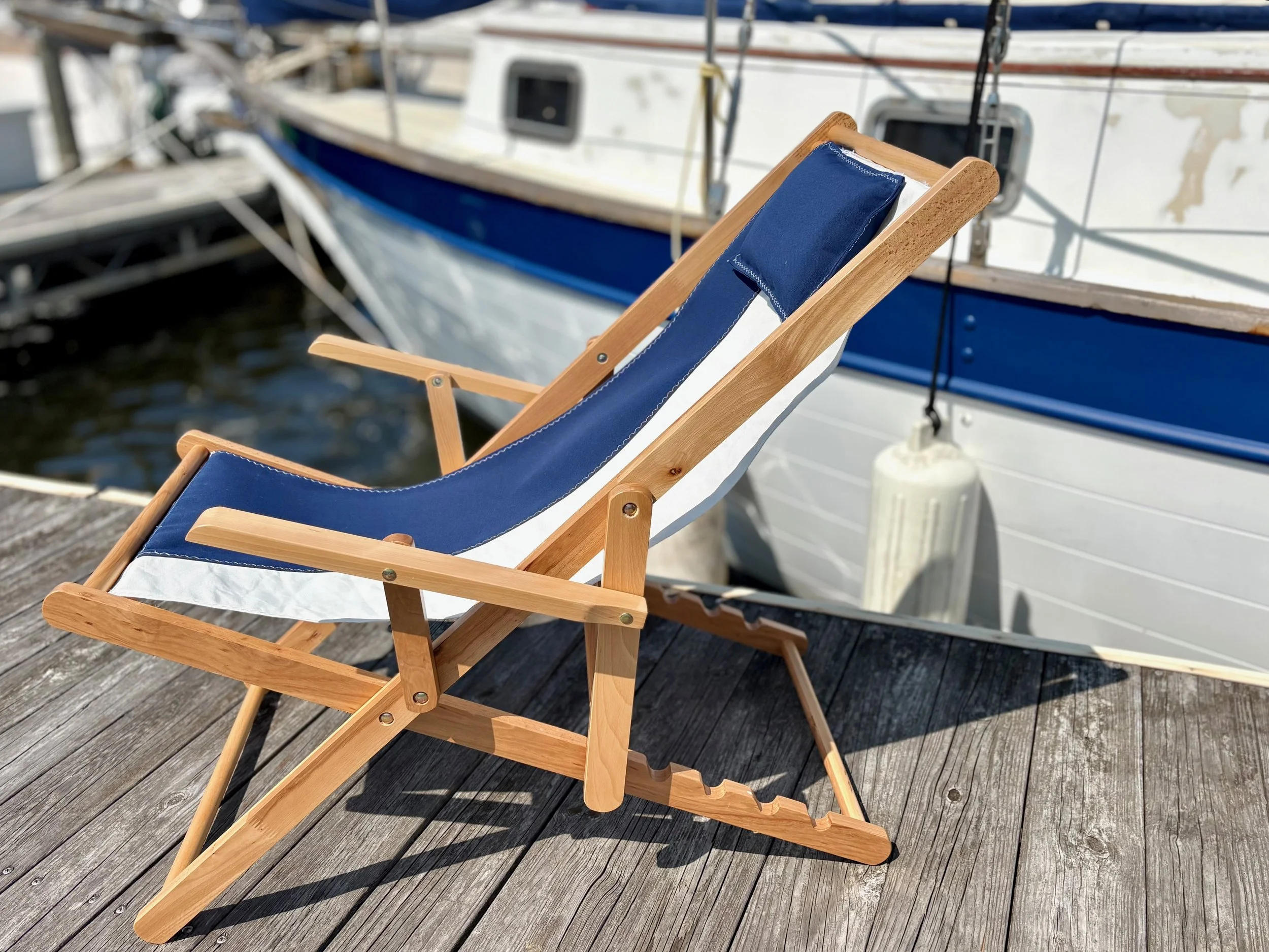 Sail chairs come with neck pillow and are designed to fold flat for easy storage