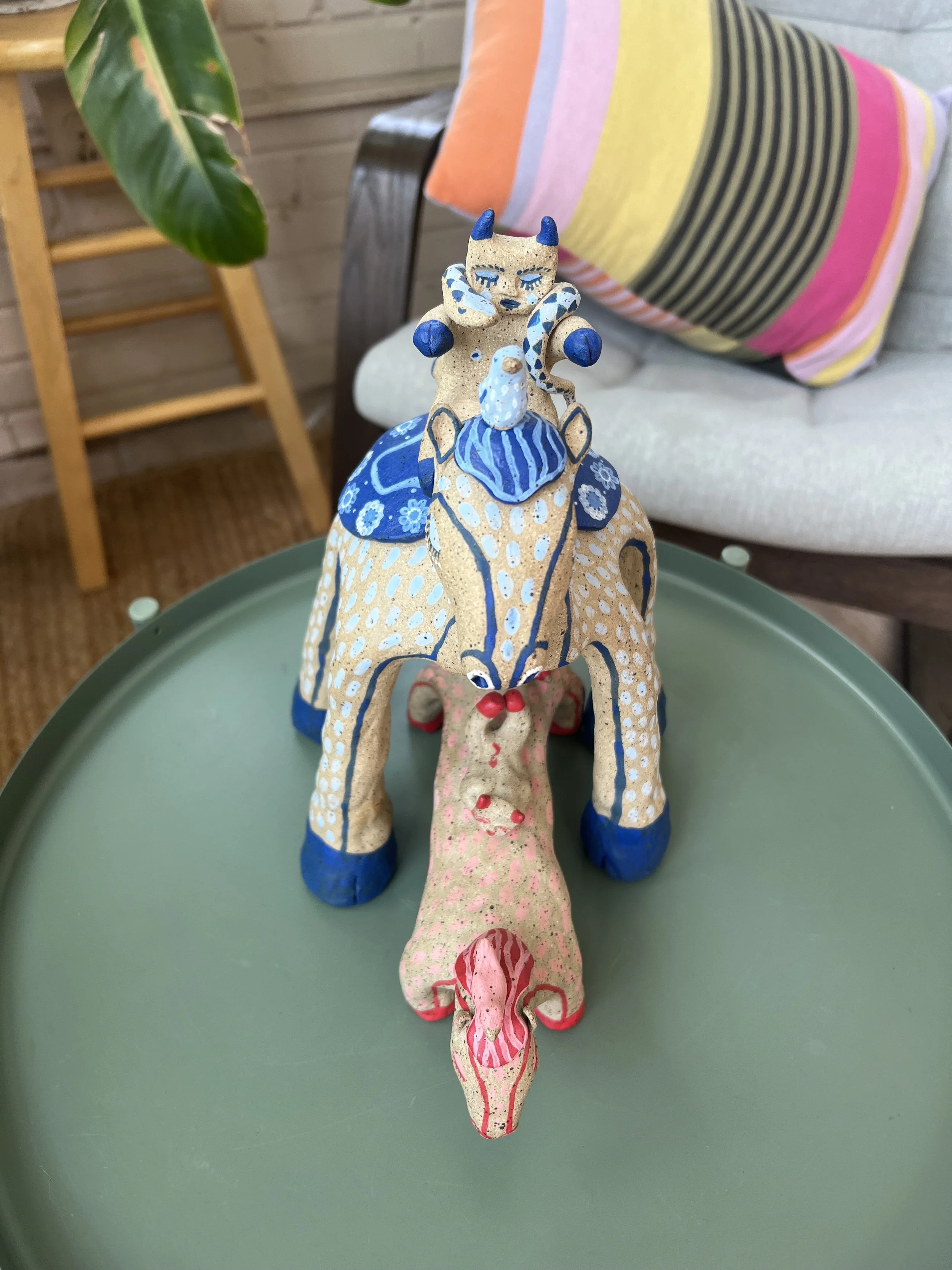tall horse and long horse front