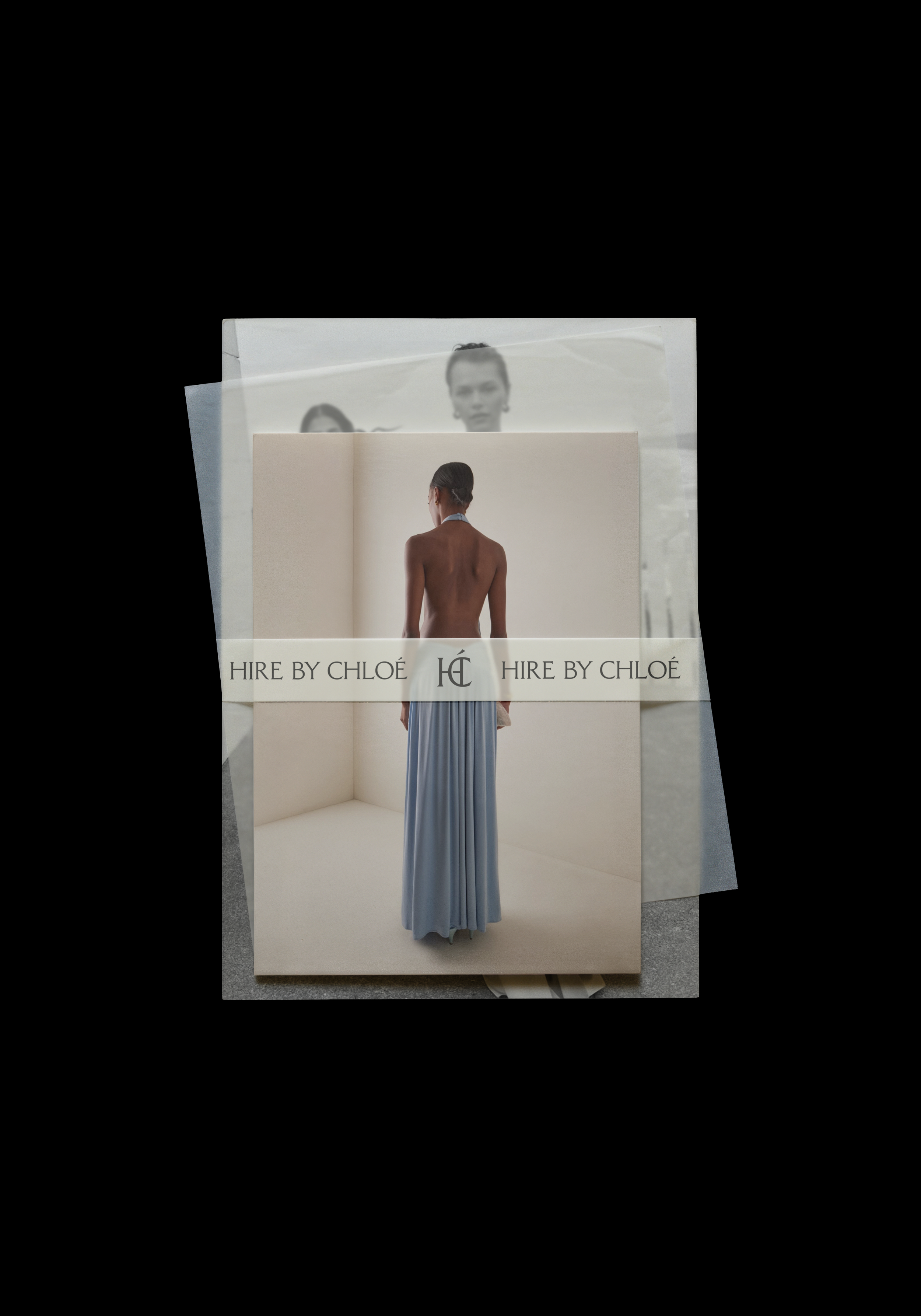 Photos of a woman in a long blue dress, viewed from the back, displayed on a stand with 'Hire by Chloé' branding.
