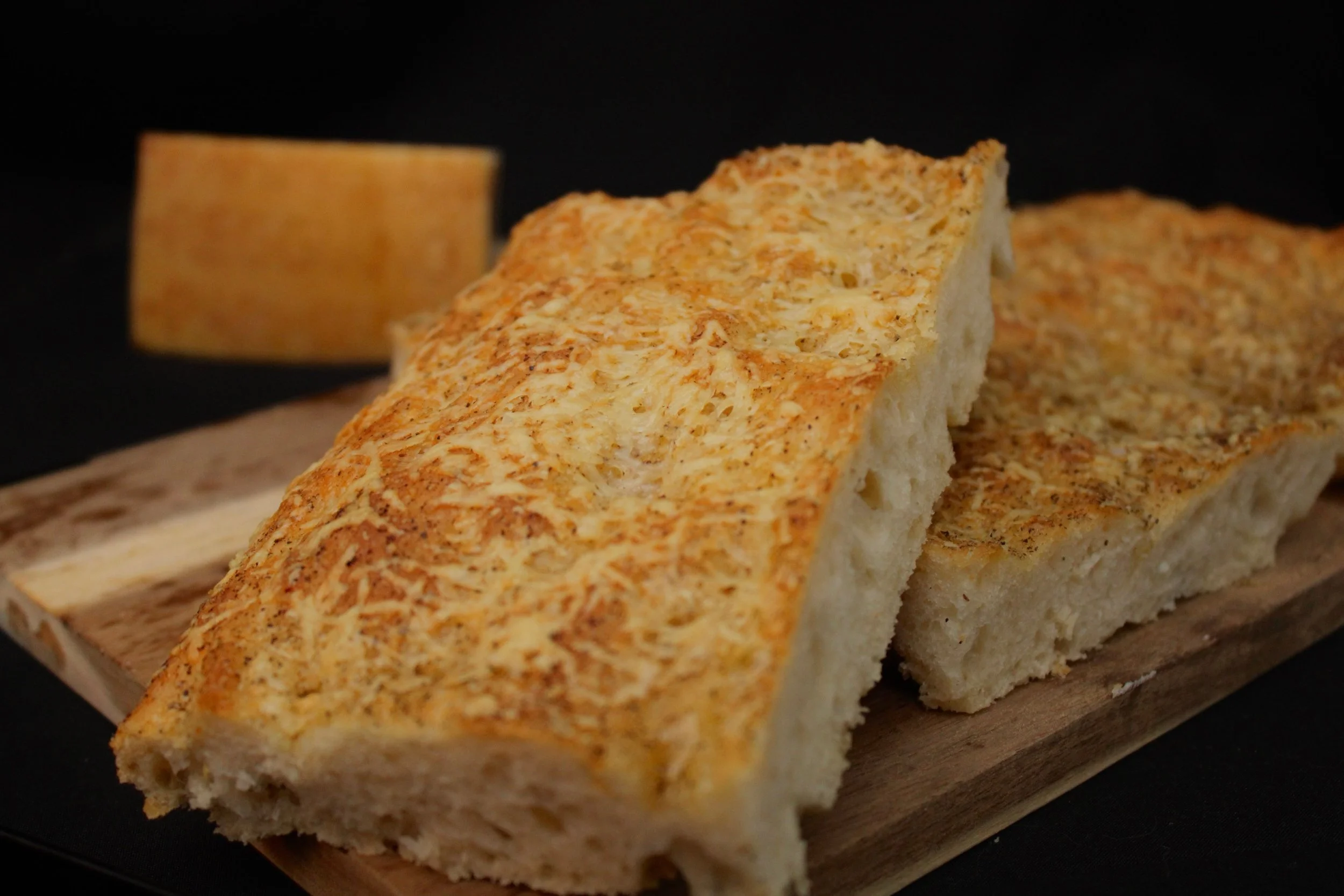 Cacio e pepe, but make it focaccia. 🤍

Our airy, golden focaccia is generously topped with Parmesan and freshly cracked black pepper, creating a savory, cheesy crust with just the right amount of bite.

Simple, classic, and utterly indulgent.

Grab 