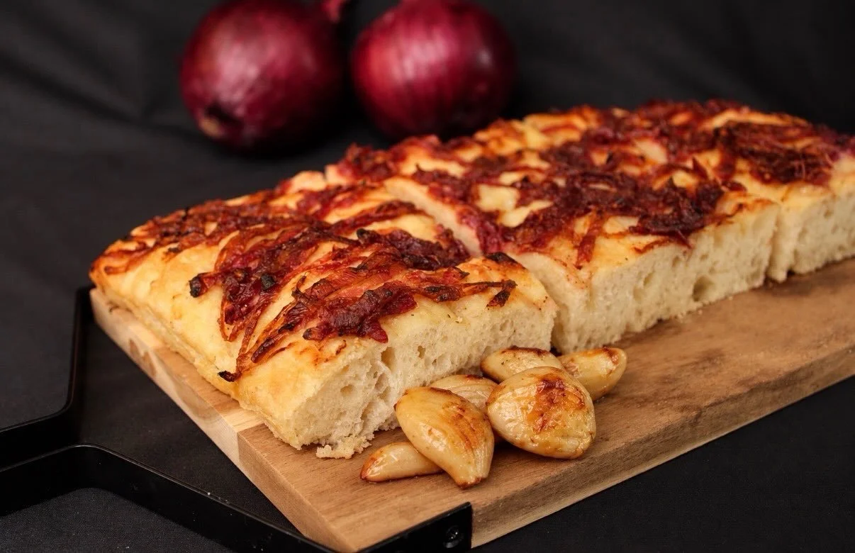 Golden, crispy, and loaded with caramelized onions and roasted garlic. Our onion &amp; garlic focaccia is the kind of bread you&rsquo;ll want to tear into straight from the table. 🧄🧅✨

Come grab a slice this Sunday!

📍 Wilton Manors Farmers Market