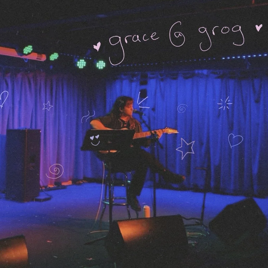 A woman sits on a stool on a stage with blue curtains, playing an acoustic guitar and singing into a microphone. Stage lights are green and purple, and there are doodles and the text 'grace @ gogo' written above.