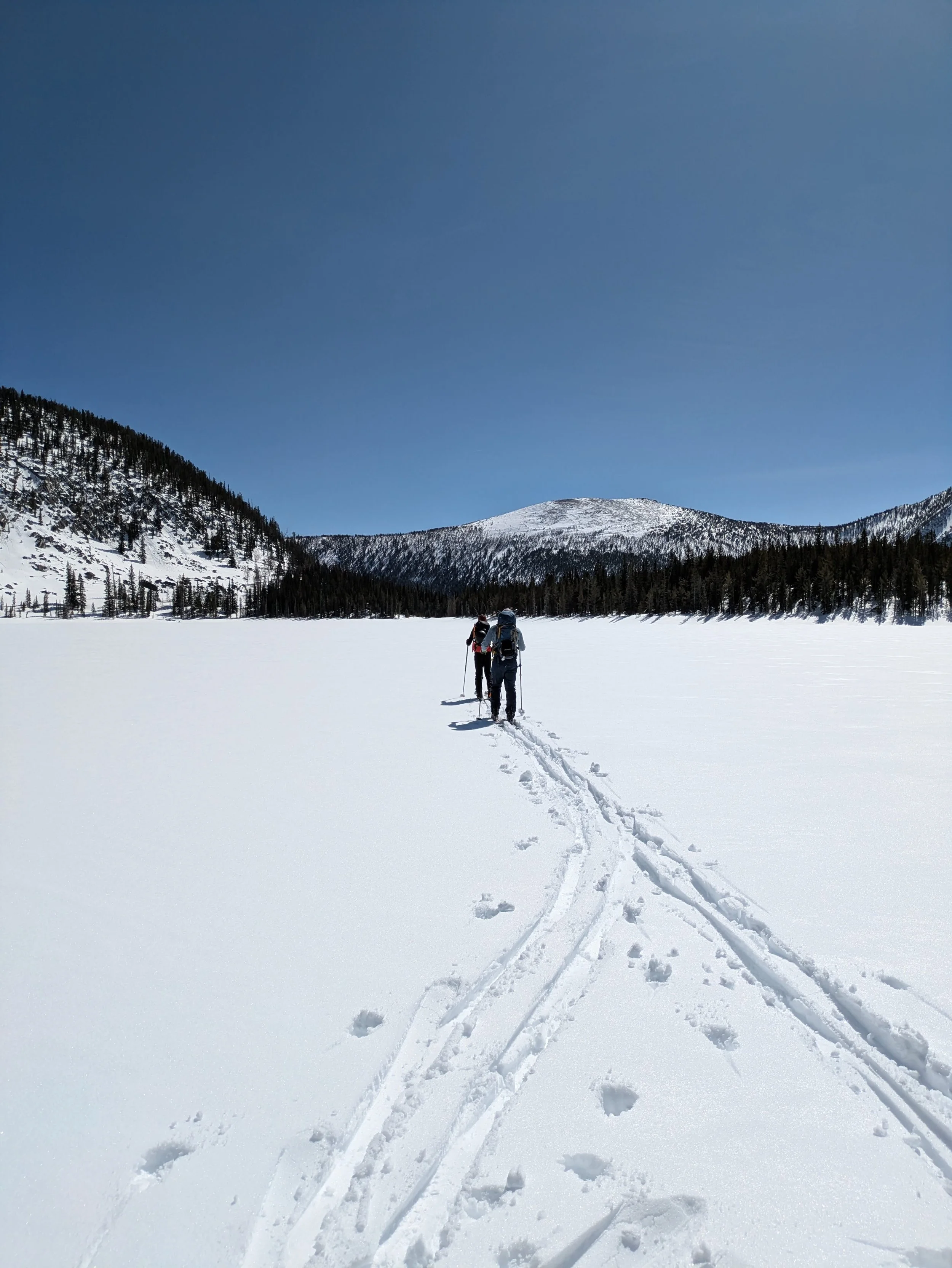 Skinning across Upper Elliot Lake on the exit