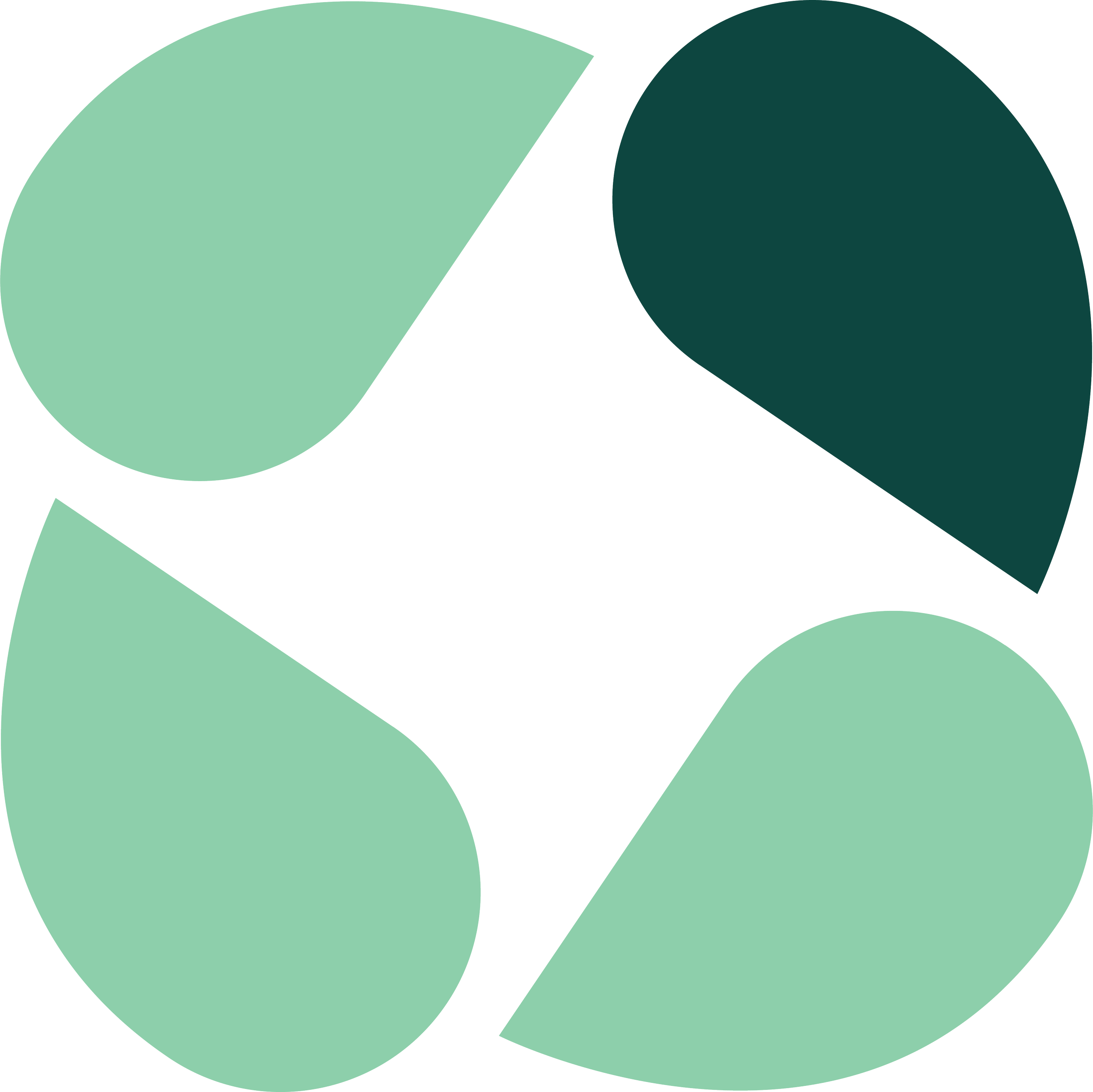 A large, green circular shape with a smaller, darker green circular shape overlapping it.