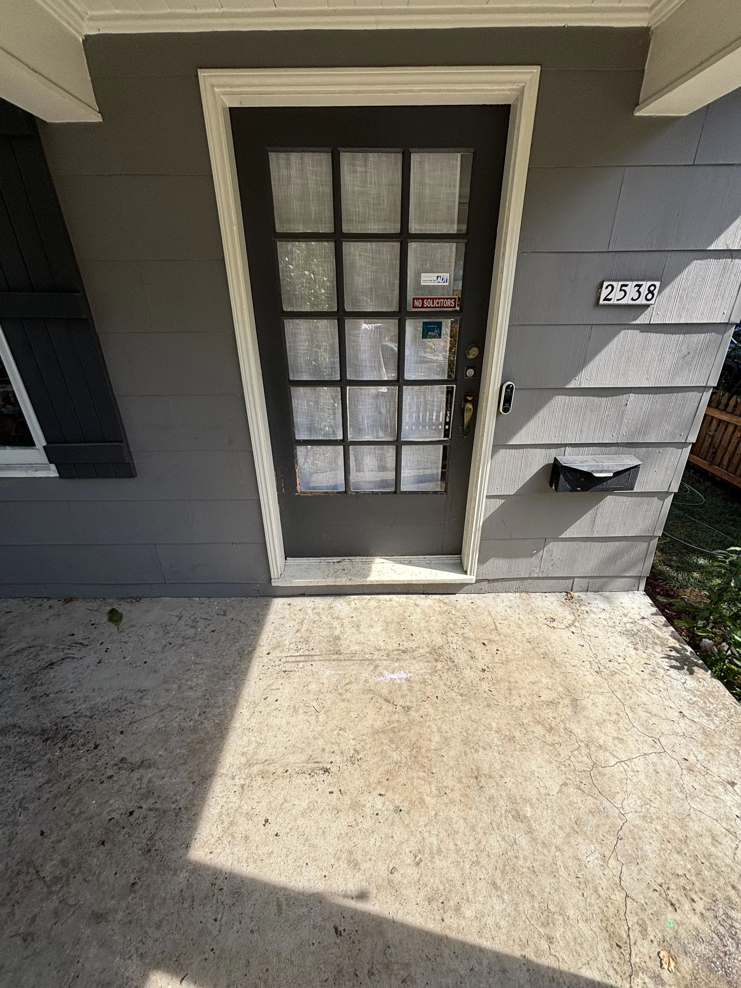Front patio before pressure washing, Portland.