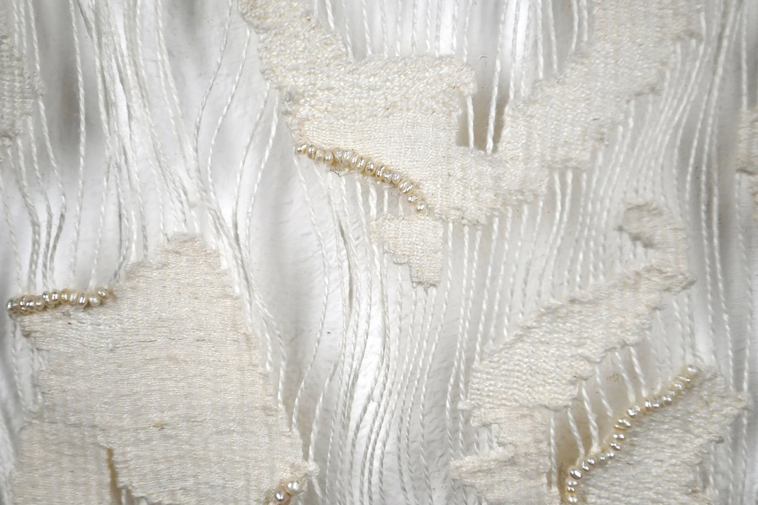 the space between, 2025. linen, pearls.