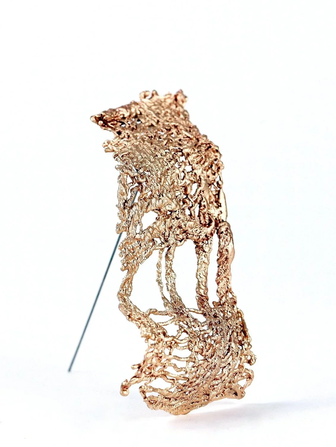 touching absence #2. 2026. brass, silver, steel.