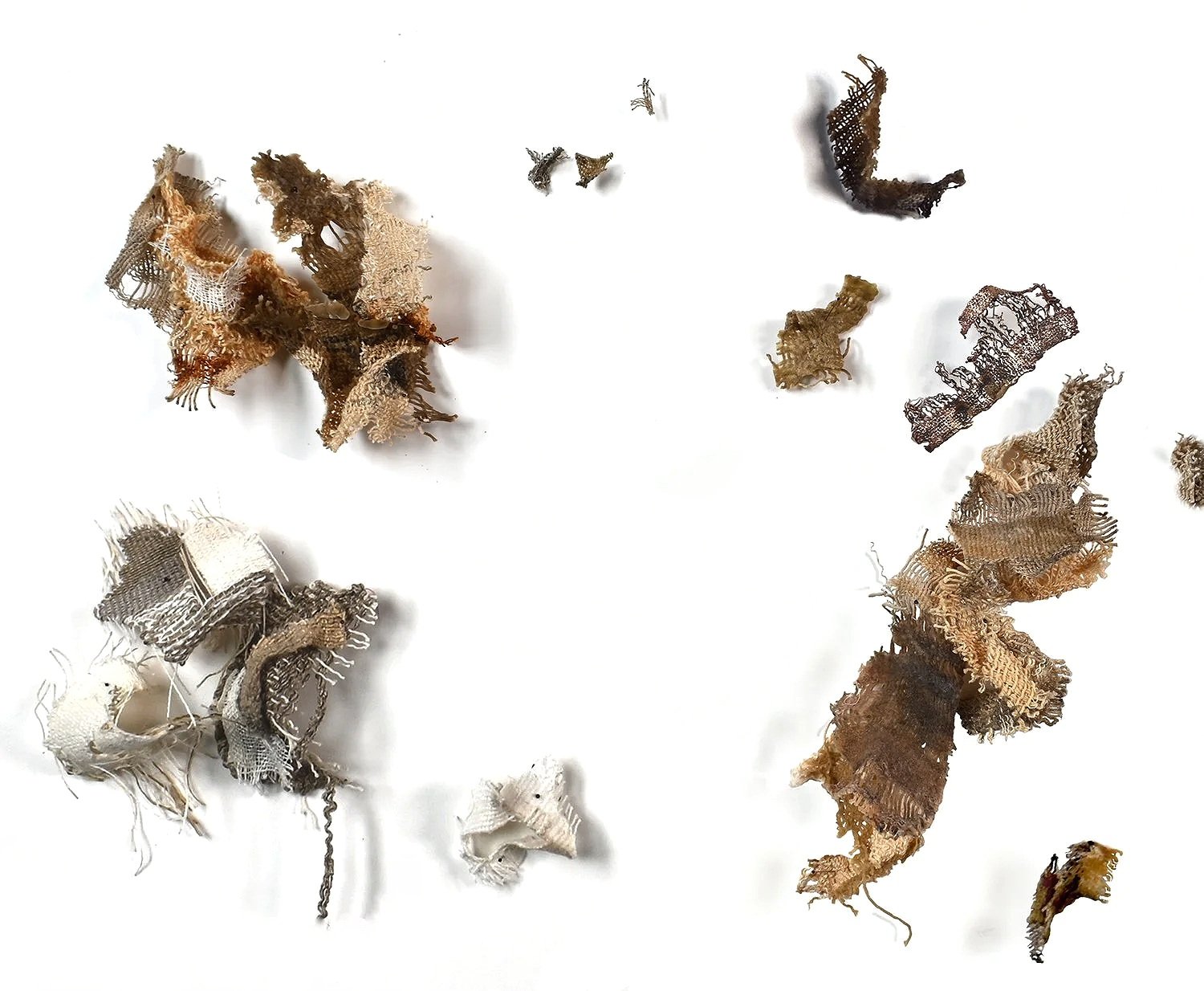 touching absence, 2026. linen, wax, metals, pins.