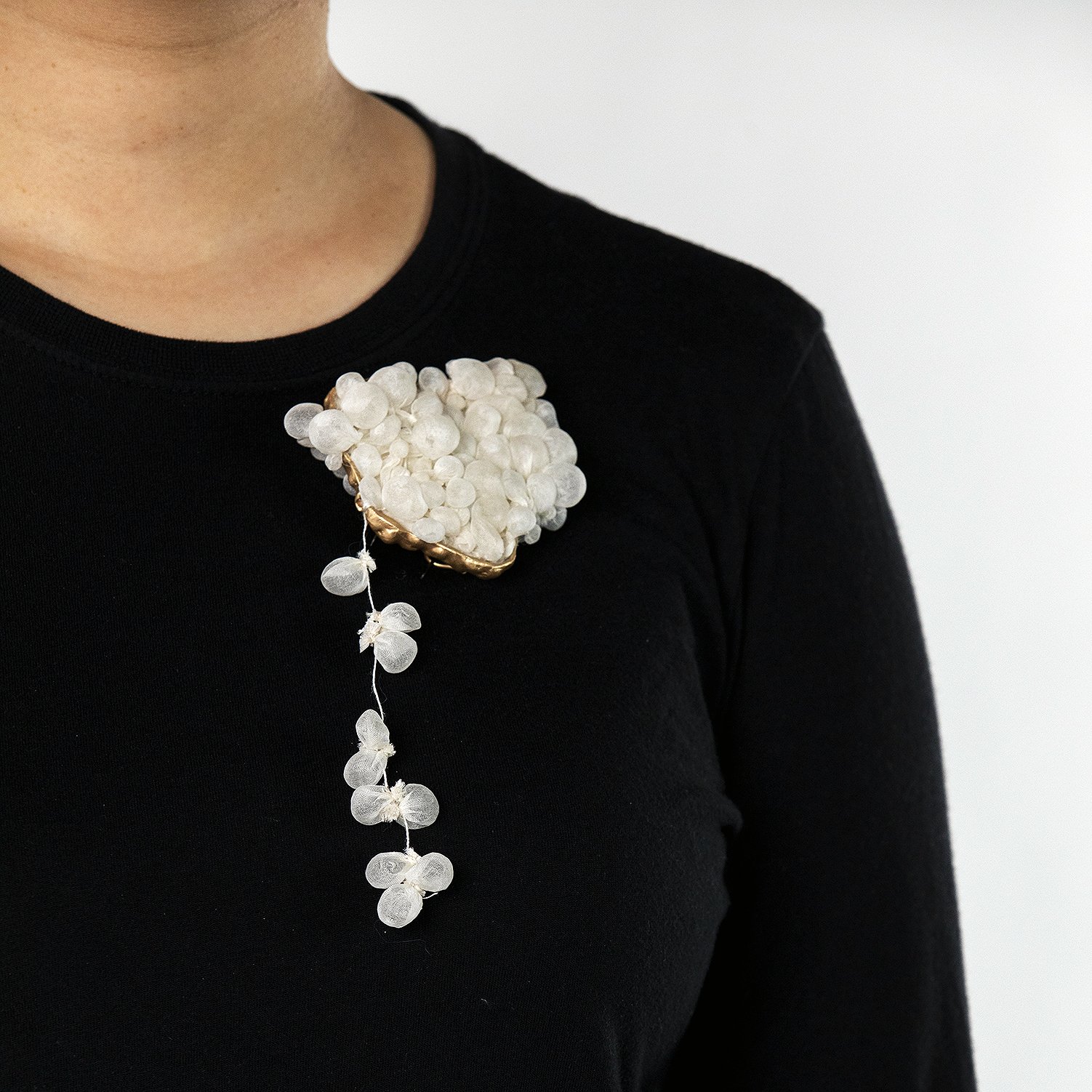 holding air #2, 2026. silk, brass, linen.*