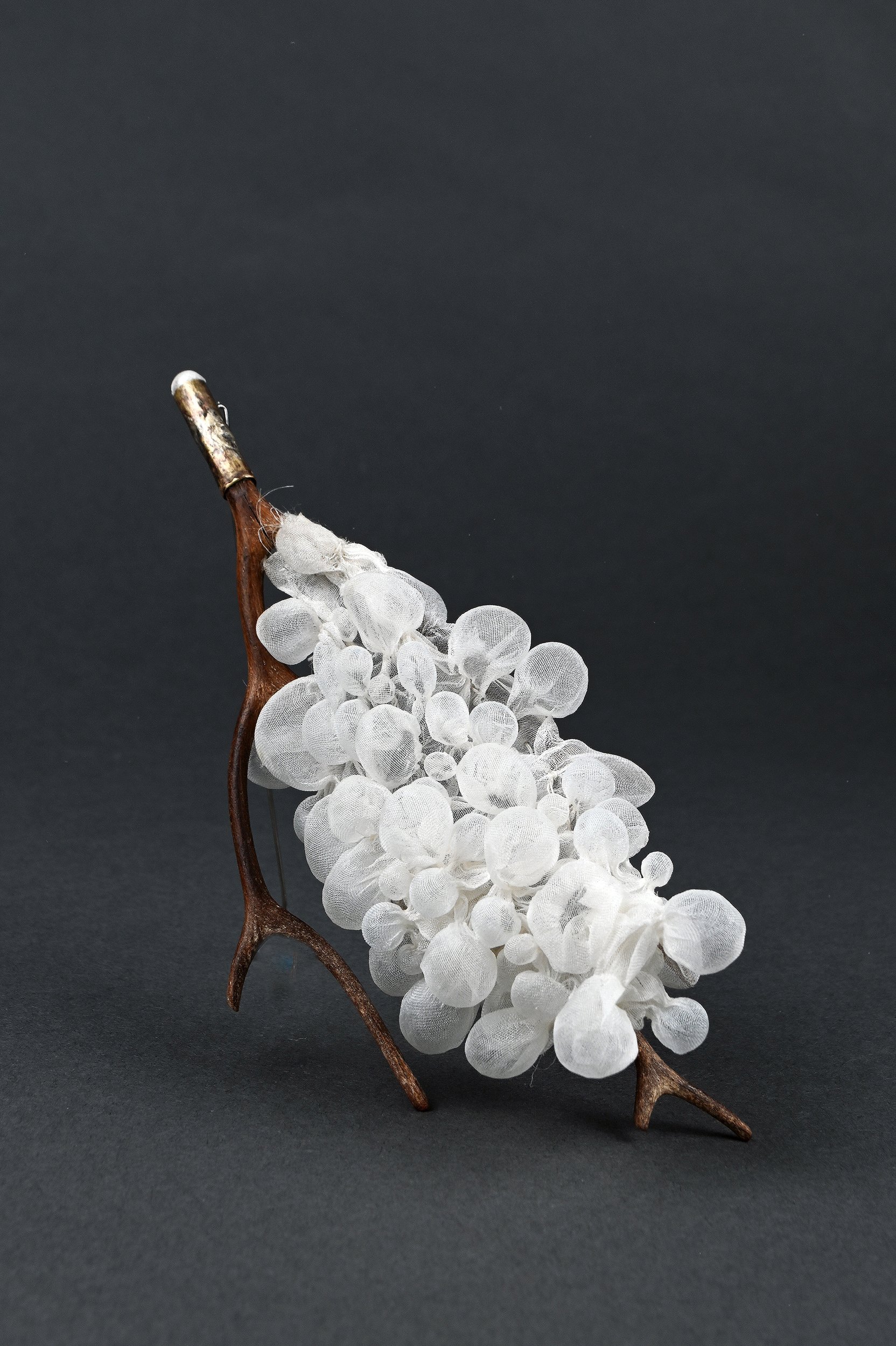 holding air #1, 2026. silk, found object, silver. 
