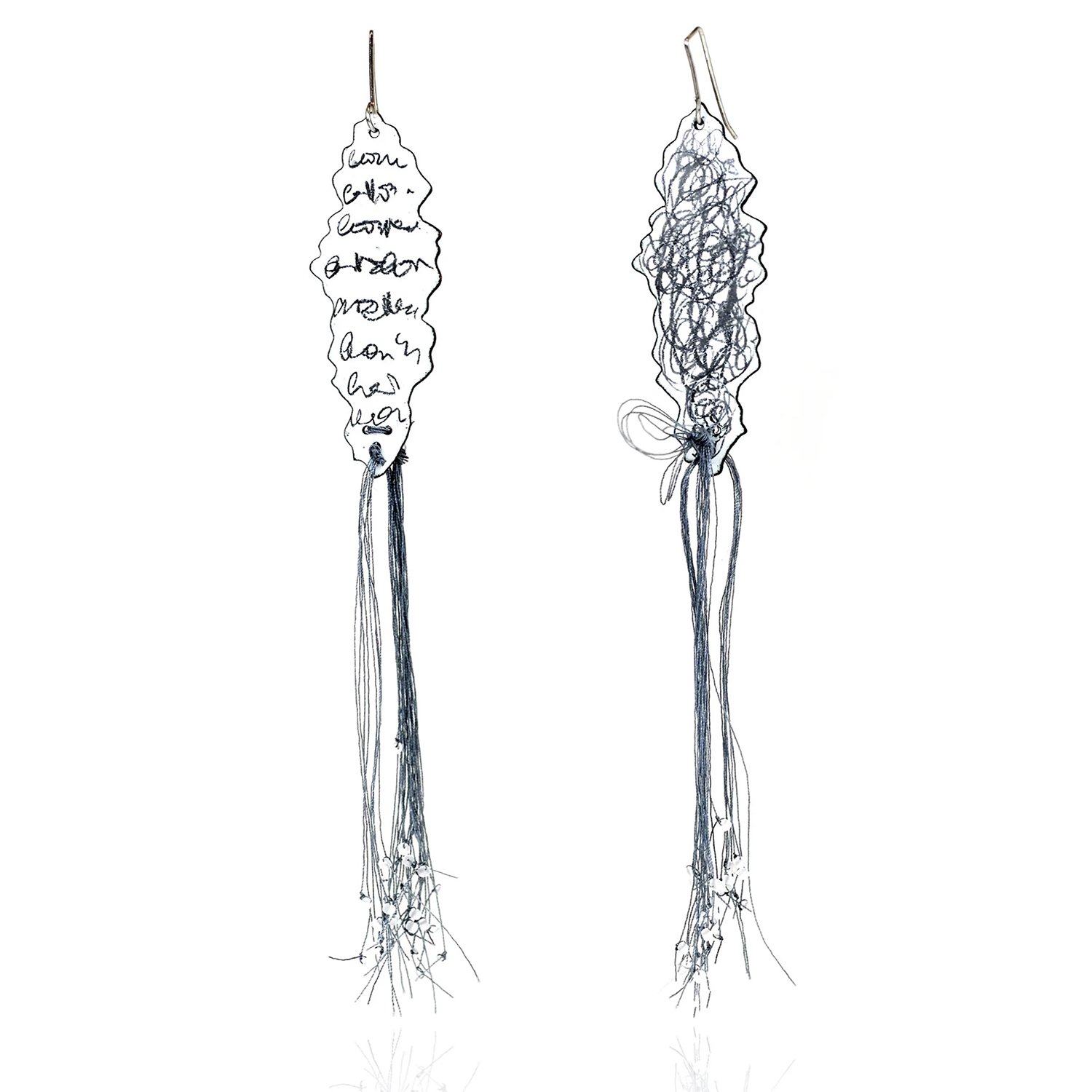 things unsaid #1, 2025. enamel, graphite, silver, thread, beads.