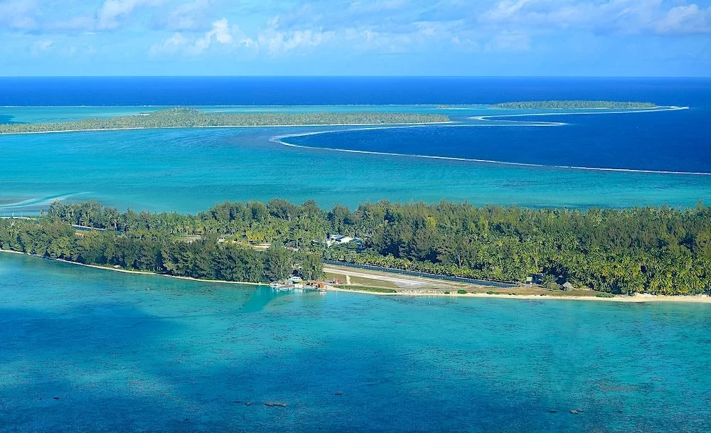 Aerial view of a coral atoll and its lagoon