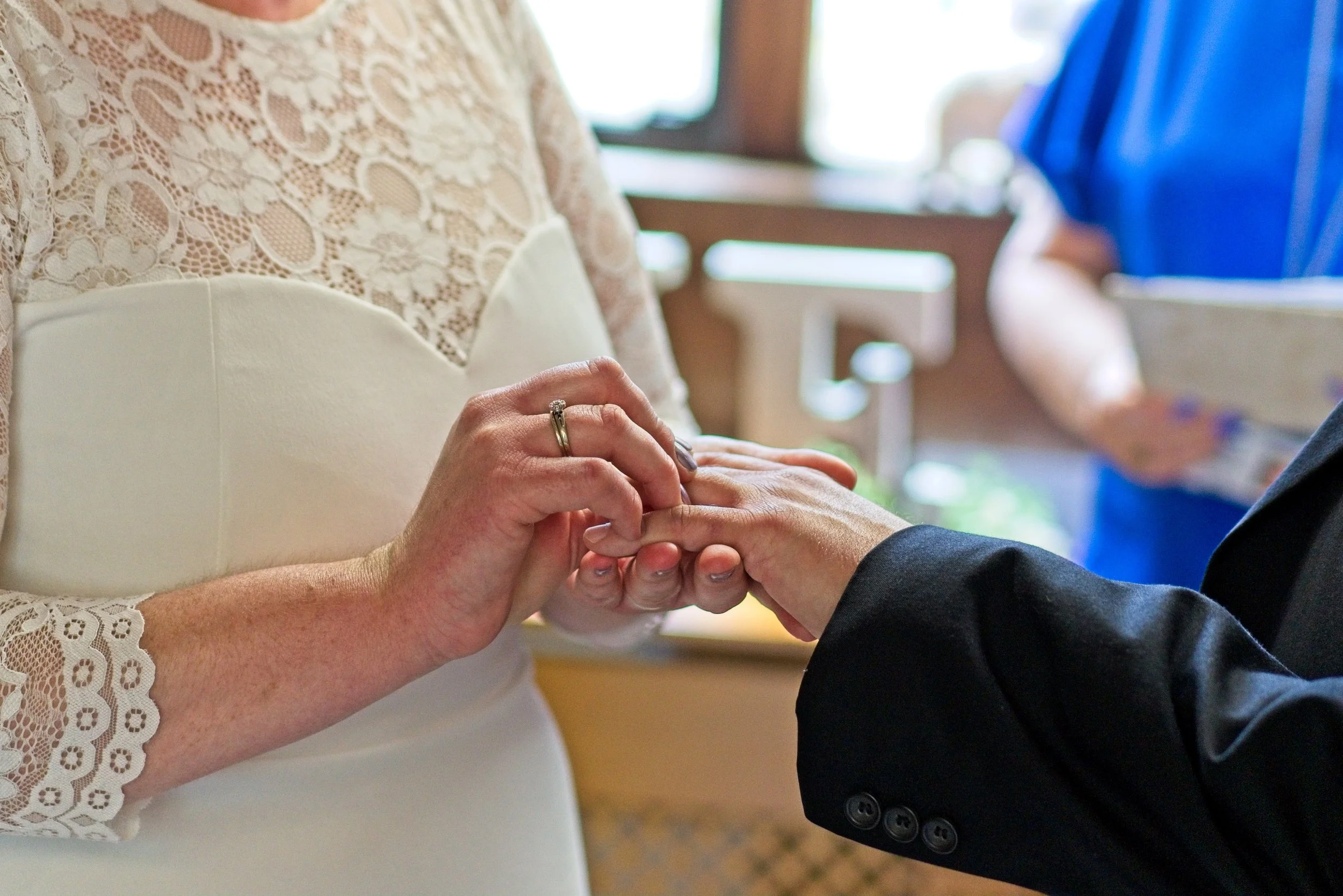 Candid wedding photography capturing the bride and groom’s ceremony at Stratford Registry Office in Warwickshire.