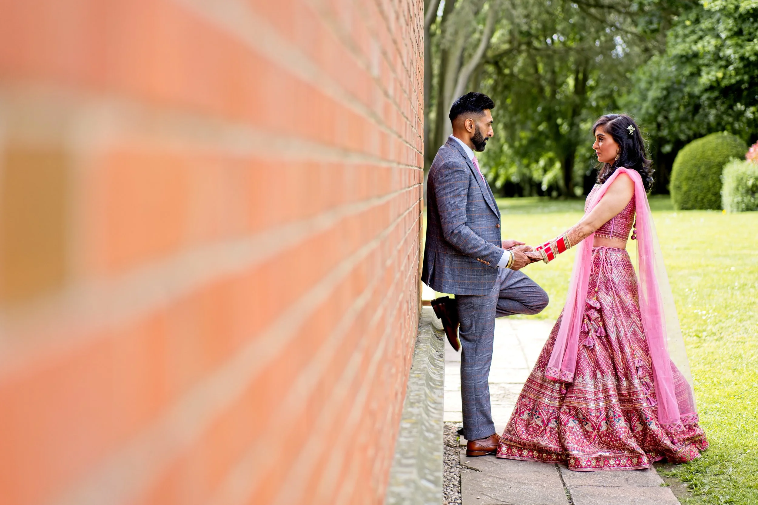 Wedding photography capturing the bride and groom at MacDonald Hotel in Coventry.