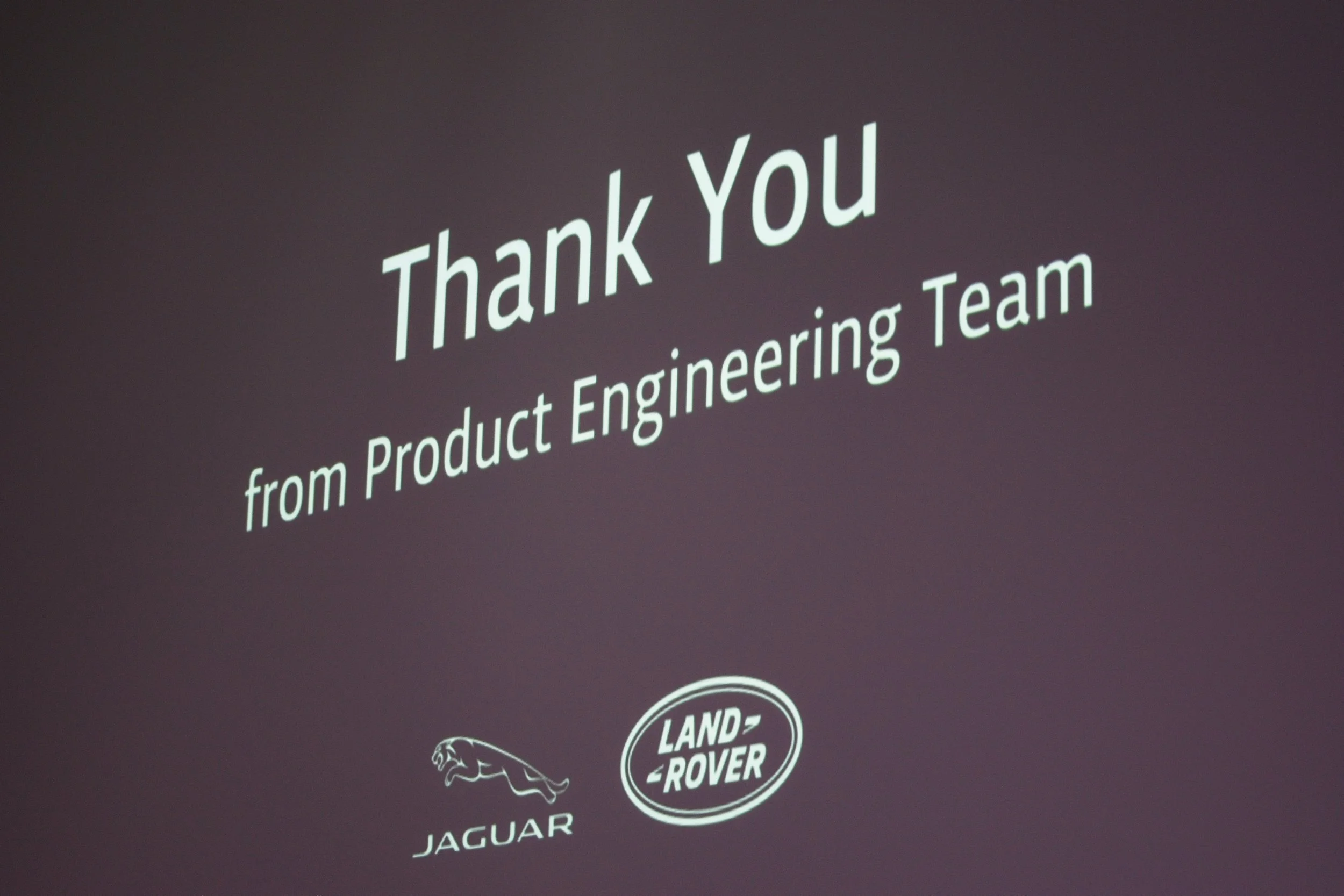 Slide shows a thank you message from the product engineering team with logos of Jaguar and Land Rover. Event Photography by photographer based in Southam, Warwickshire.