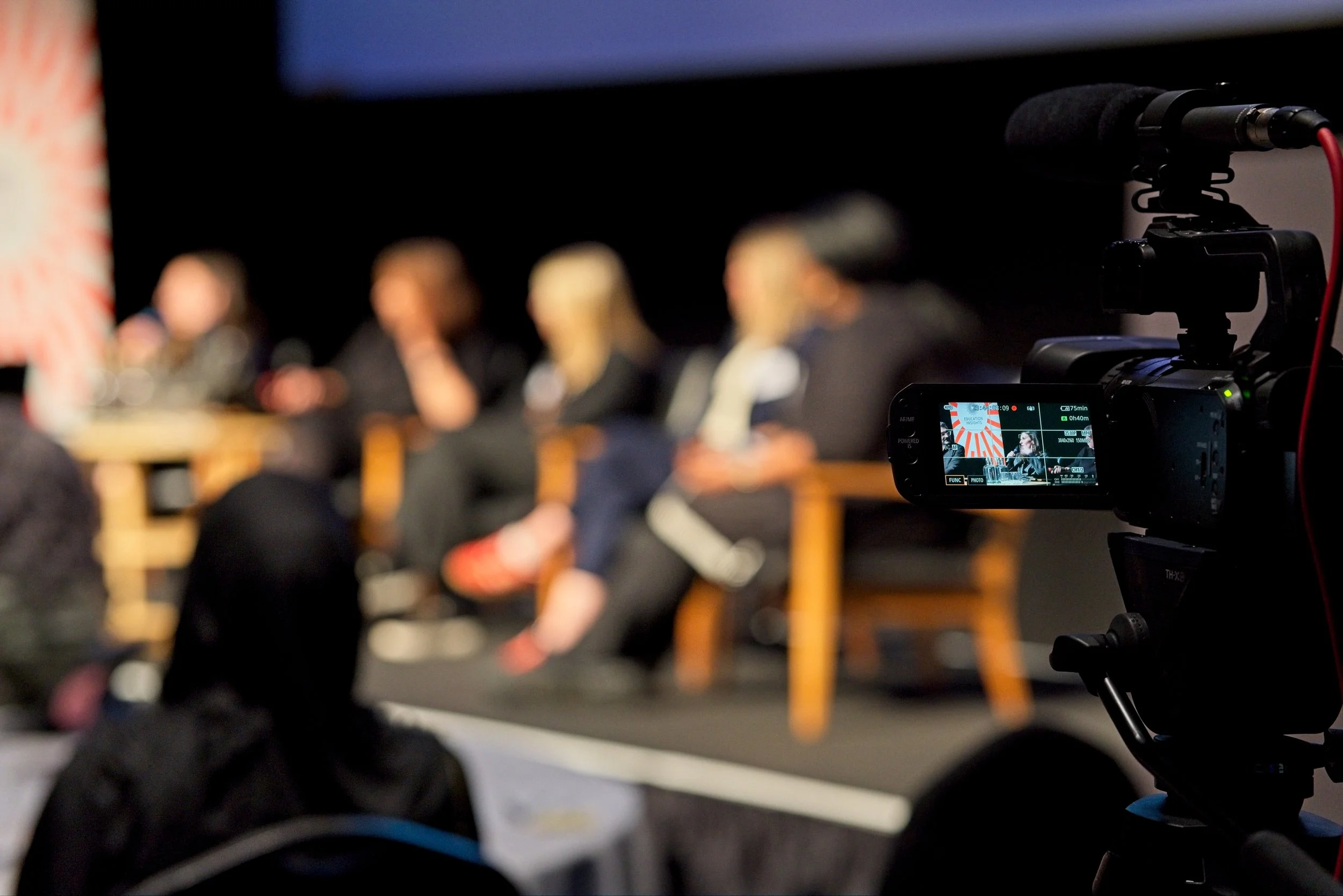 Recording panel speakers at educational event