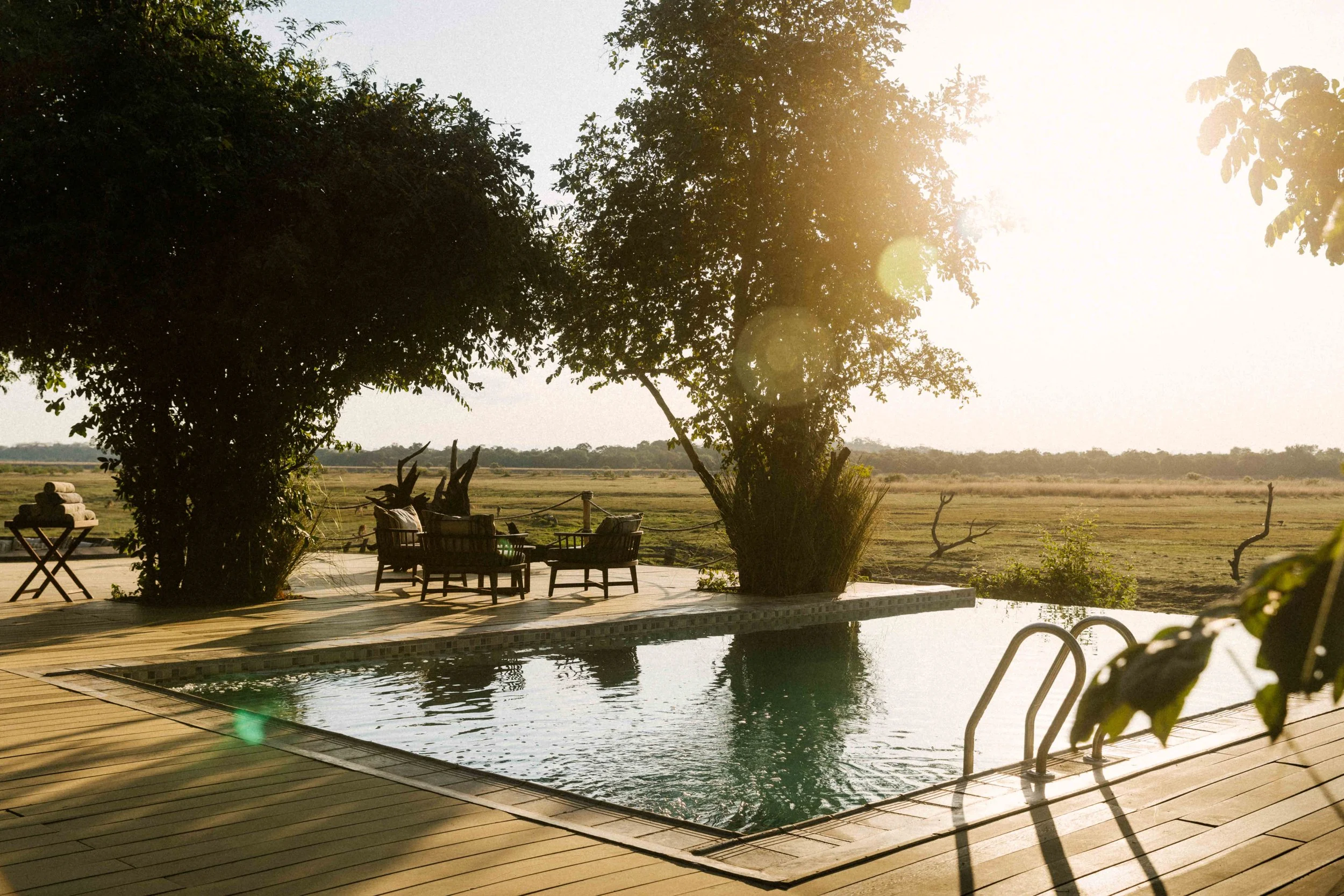 Kafunta River Lodge  for Classic Comfort & Prestige

The Vibe: High-end, relaxed, and beautifully integrated into the riverine forest.

The Rooms: Private, thatched luxury chalets built on raised wooden platforms with private viewing decks.

The Priv