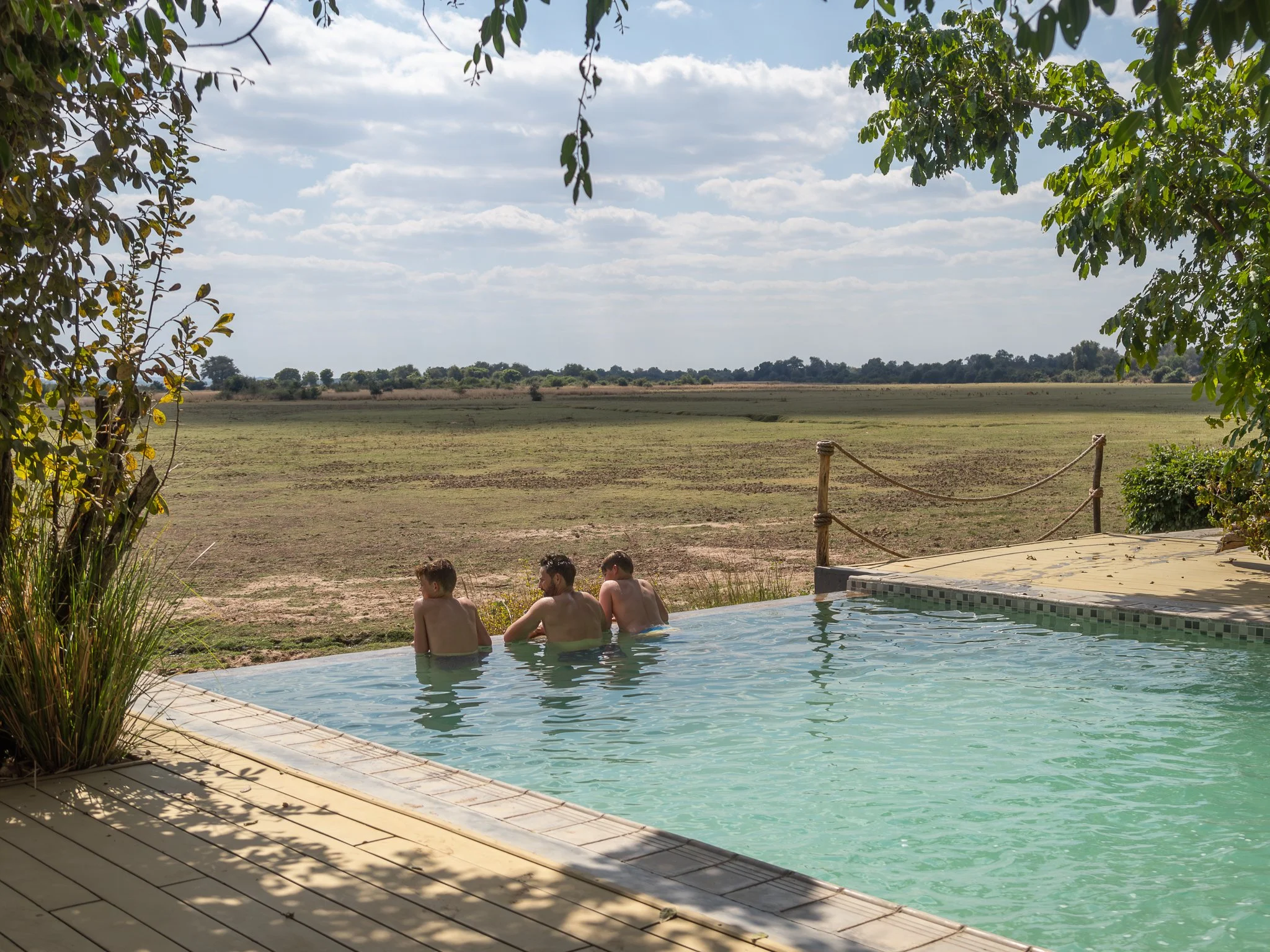 Lodge Relaxation: 
Pristine infinity pool and a wildlife viewing hide over the floodplain.