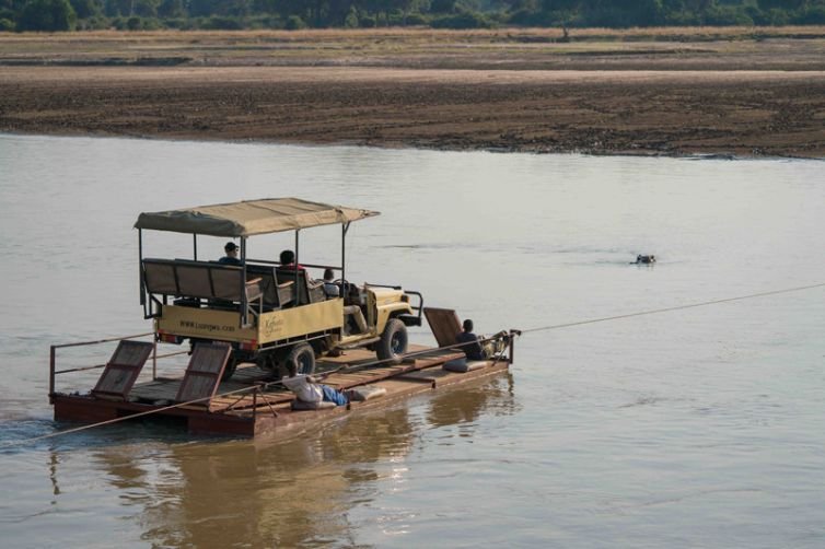 Exclusive Park Access:
 Private pontoon crossing directly into South Luangwa National Park.