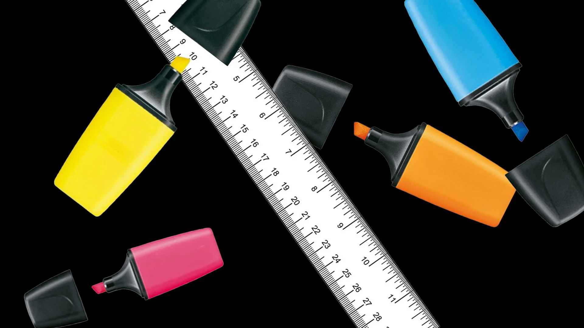 Marcatori colorati fluo posizionati lungo un righello bianco su sfondo nero.