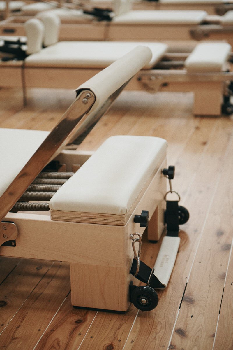A reformer footbar on the timber floor