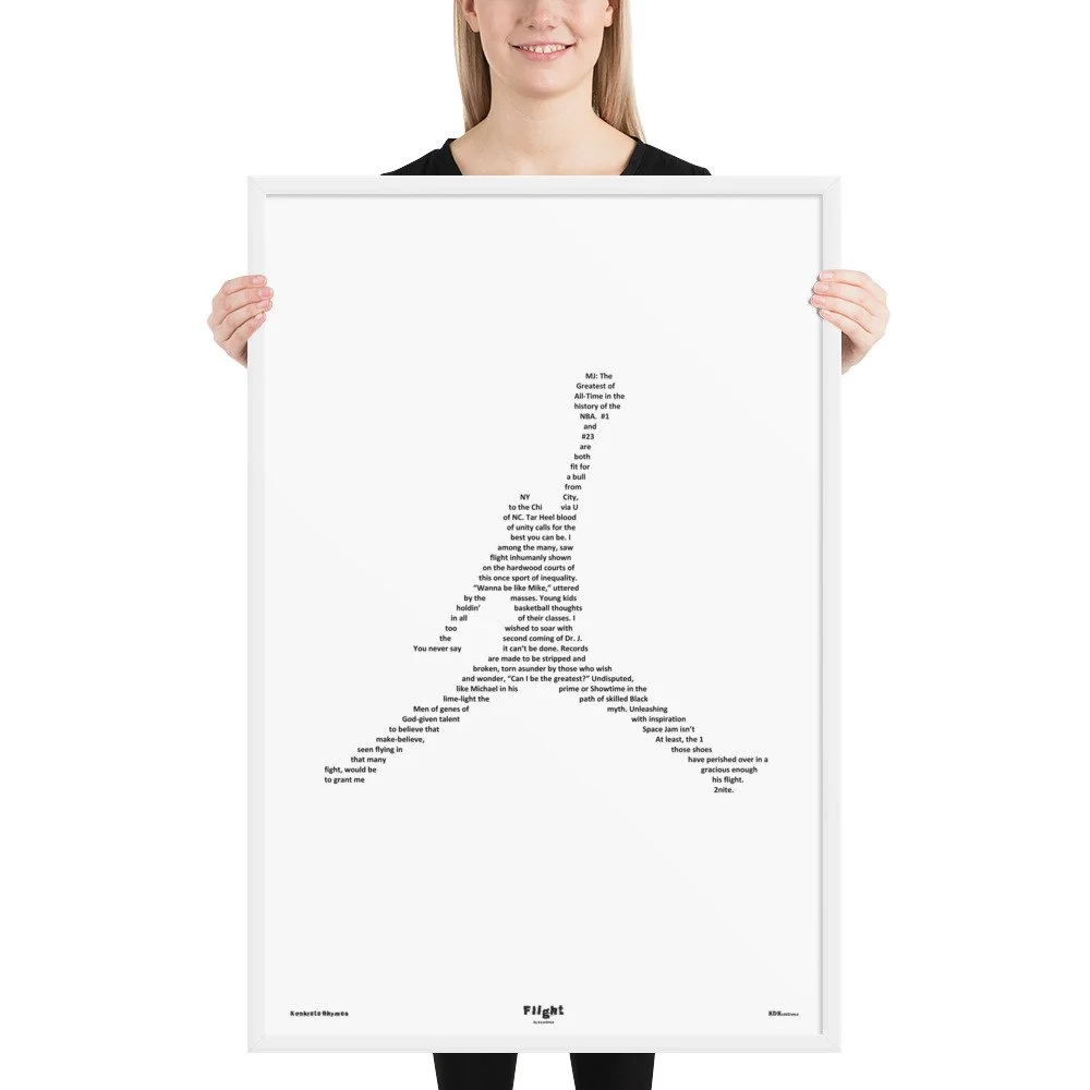Person holding a framed poster with text arranged in the shape of a silhouette of a person.