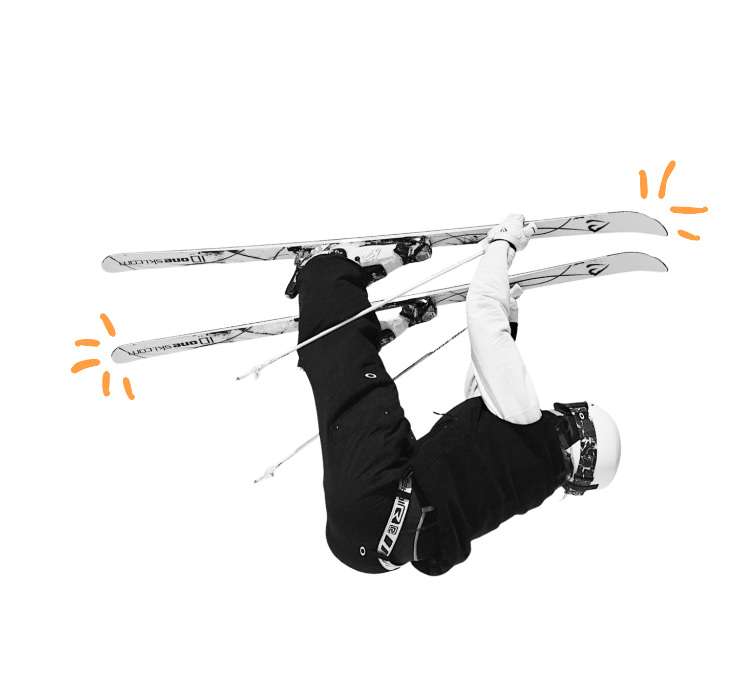 An upside-down skier in mid-air performing a trick, wearing a black and white outfit, helmet, and gloves, holding ski poles, with skis marked 'Oneway' and orange supports in the background.
