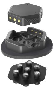 Exploded view of the Gowerlabs LUMO modular fNIRS tile showing the sensor module, docking base, and optical source-detector array for high-density brain imaging.