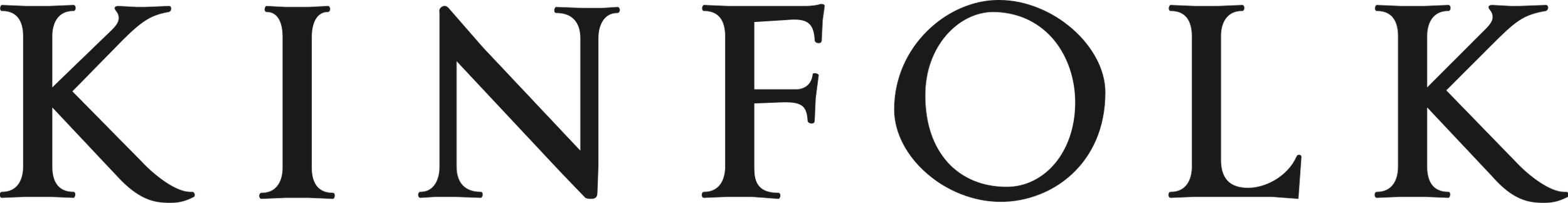 Close-up of the black logo reading 'KINFOLK' in capital letters.