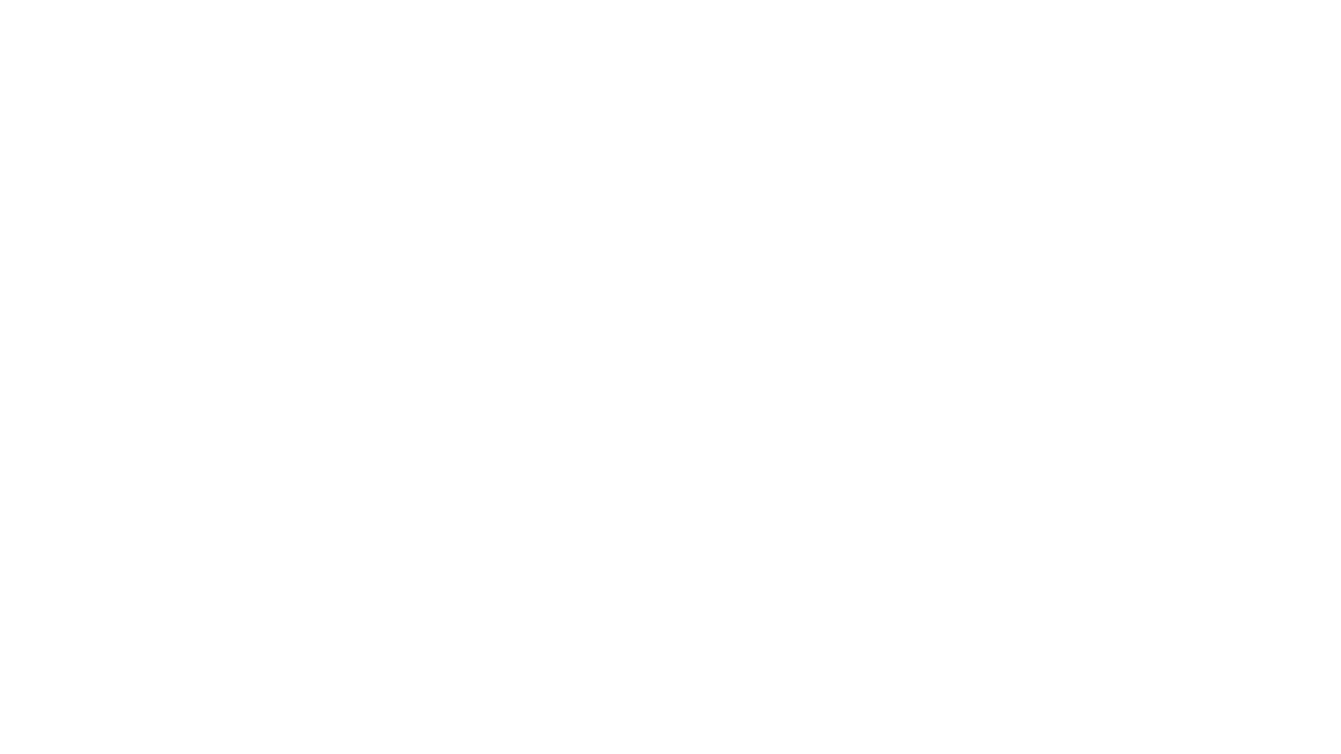 Spotify logo in black and white with the text Spotify next to a circular icon with curved lines.