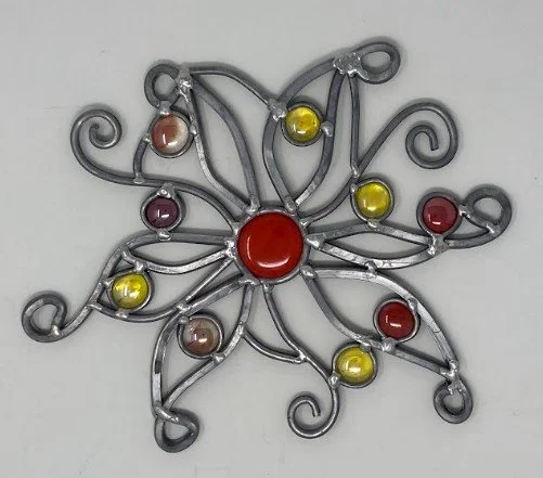 Metal garden flower with red, orange, and yellow glass jewels. 12 x 10 inch. Sold.